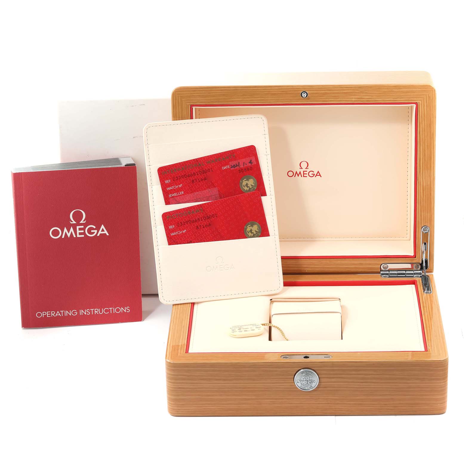 The image shows the packaging, instruction manual, warranty cards, and display box of the Omega Planet Ocean 232.90.46.51.03.001 Men
s Titanium Blue Dial 232.90.46.51.03.001 Men
s Titanium Blue Dial model watch, shot from above.