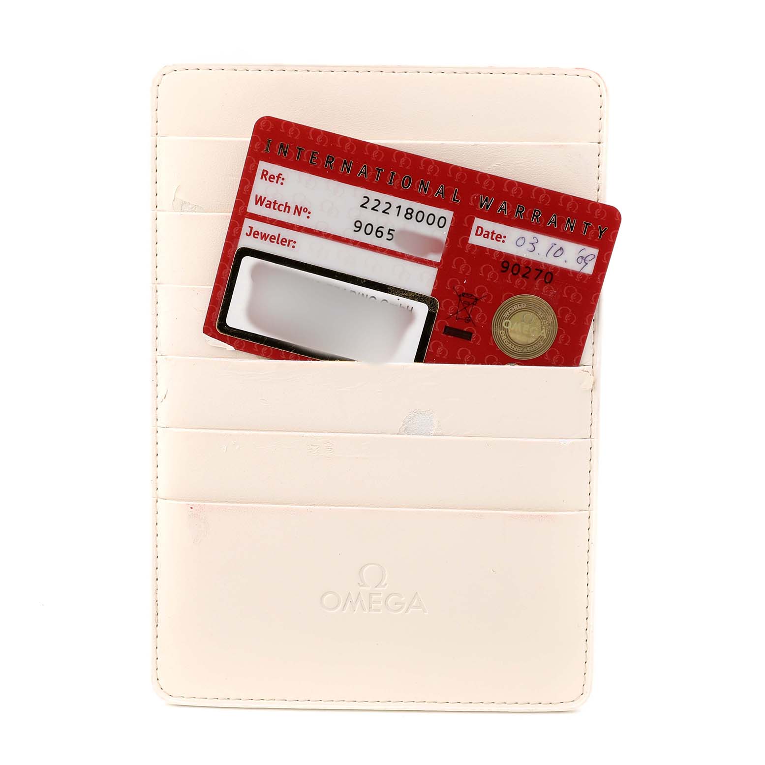 The image shows a beige Omega cardholder with an International Warranty card for the Omega Seamaster 2221.80.00 Men's Stainless Steel Blue Dial model.