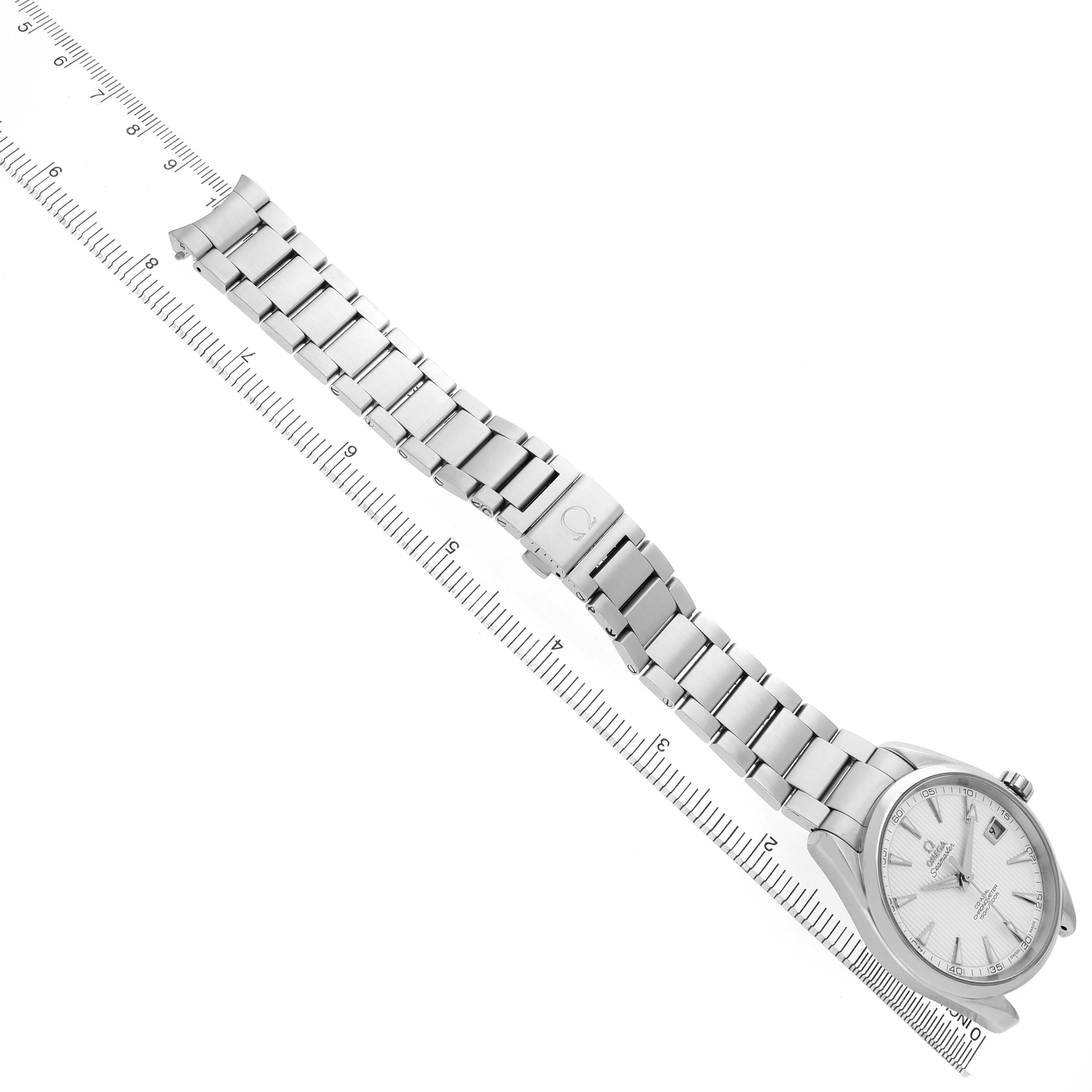 The Omega Aqua Terra 231.10.42.21.02.001 Men's Stainless Steel Silver Dial watch is shown at a slight angle, displaying the bracelet, clasp, and face with a ruler for scale.