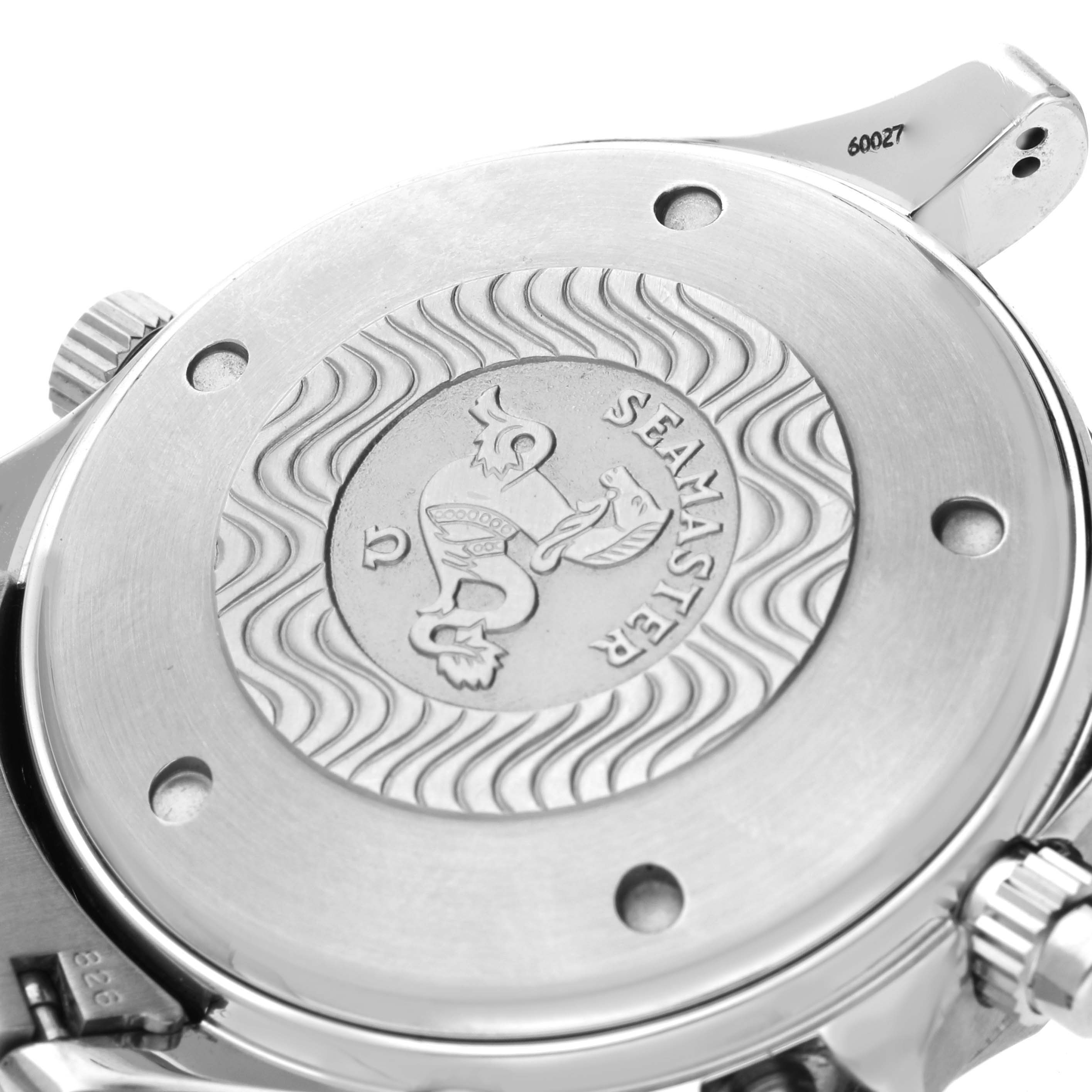 The image shows the case back of the Omega Seamaster 2599.80.00 Men's Stainless Steel Blue Dial 2599.80.00 Men's Stainless Steel Blue Dial watch, highlighting the engraved logo and part of the crown.