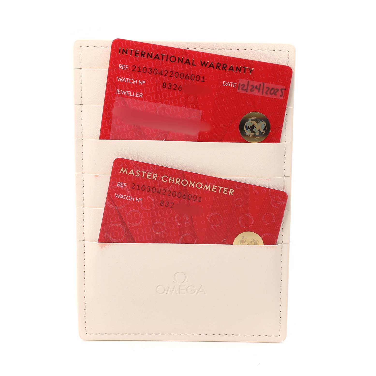 The image shows two red cards in a beige Omega cardholder for the Omega Seamaster 210.30.42.20.06.001 Men's Stainless Steel Grey Dial, including an International Warranty and Master Chronometer card.