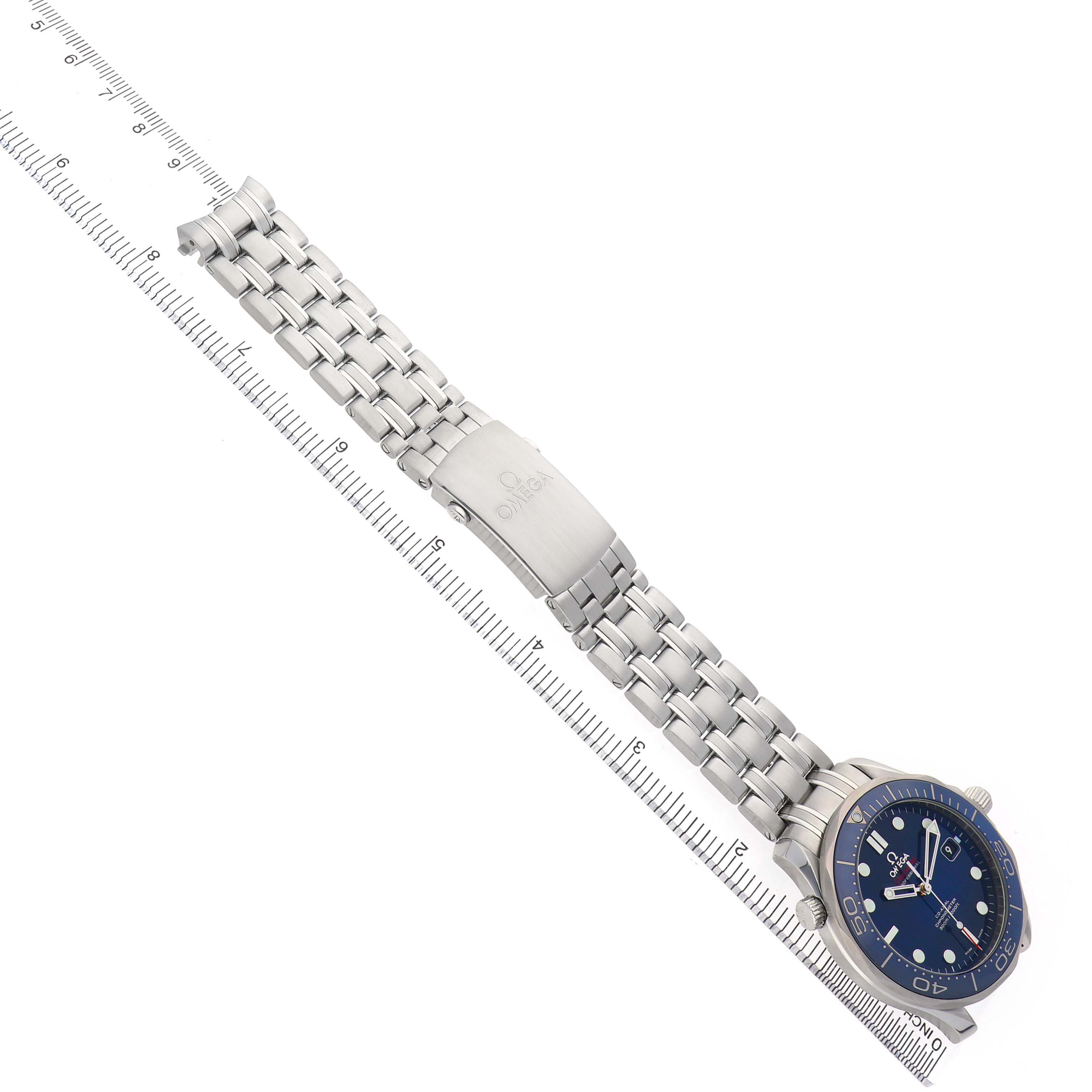 The Omega Seamaster 212.30.41.20.03.001 Men's Stainless Steel Blue Dial is shown from a top-down angle, featuring the face, stainless steel bracelet, and clasp alongside a ruler measurement.