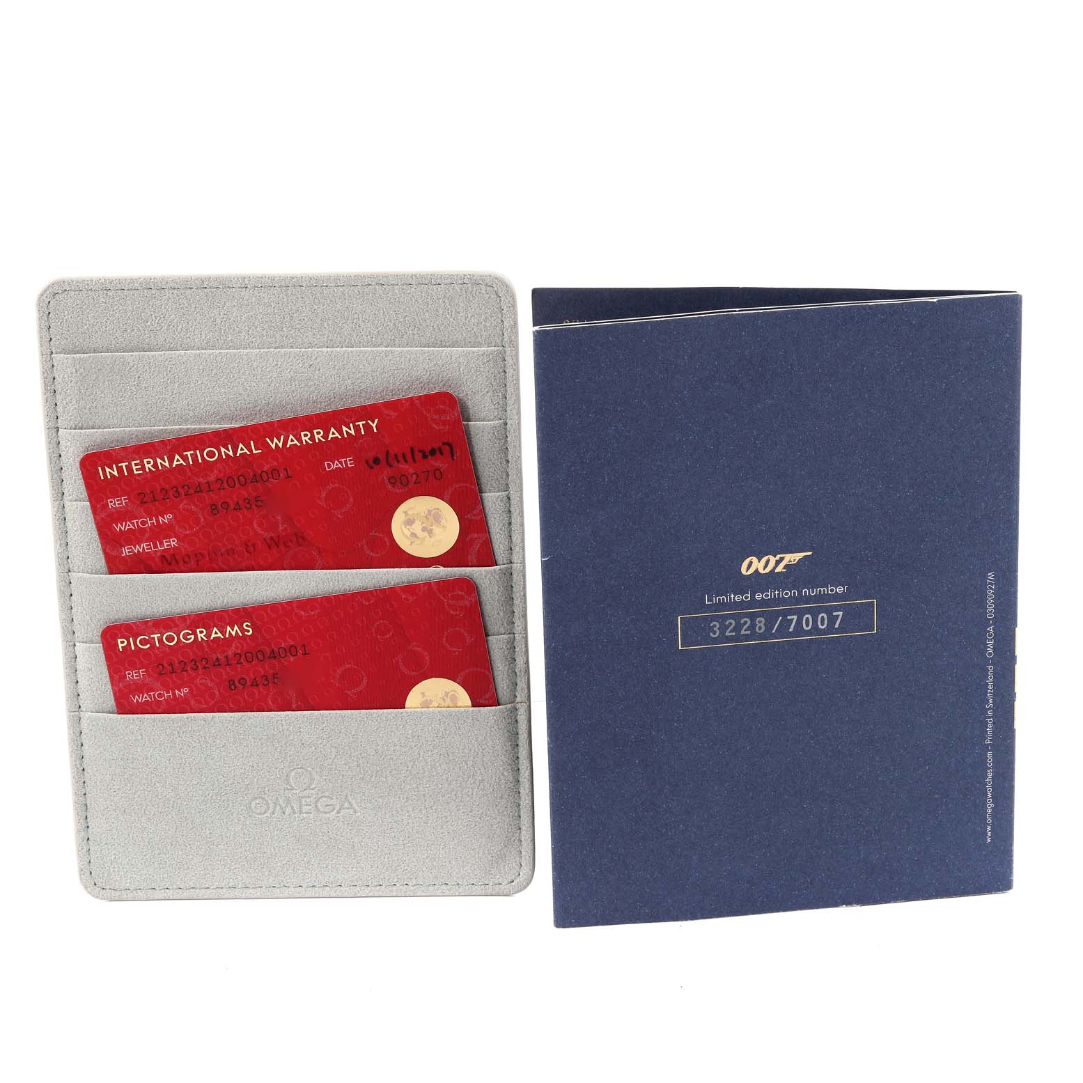The image shows the warranty cards and booklet for the Omega Seamaster 212.32.41.20.04.001 Men's Stainless Steel White Dial 212.32.41.20.04.001 Men's Stainless Steel White Dial 007 Limited Edition watch.