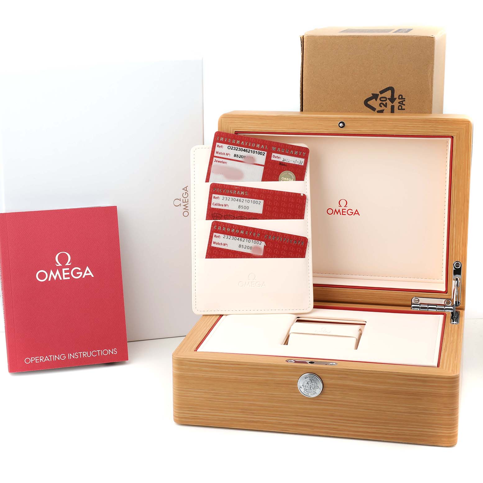 The image shows an Omega Planet Ocean 232.30.46.21.01.002 Men's Stainless Steel Black Dial watch box with documentation and operating instructions visible.