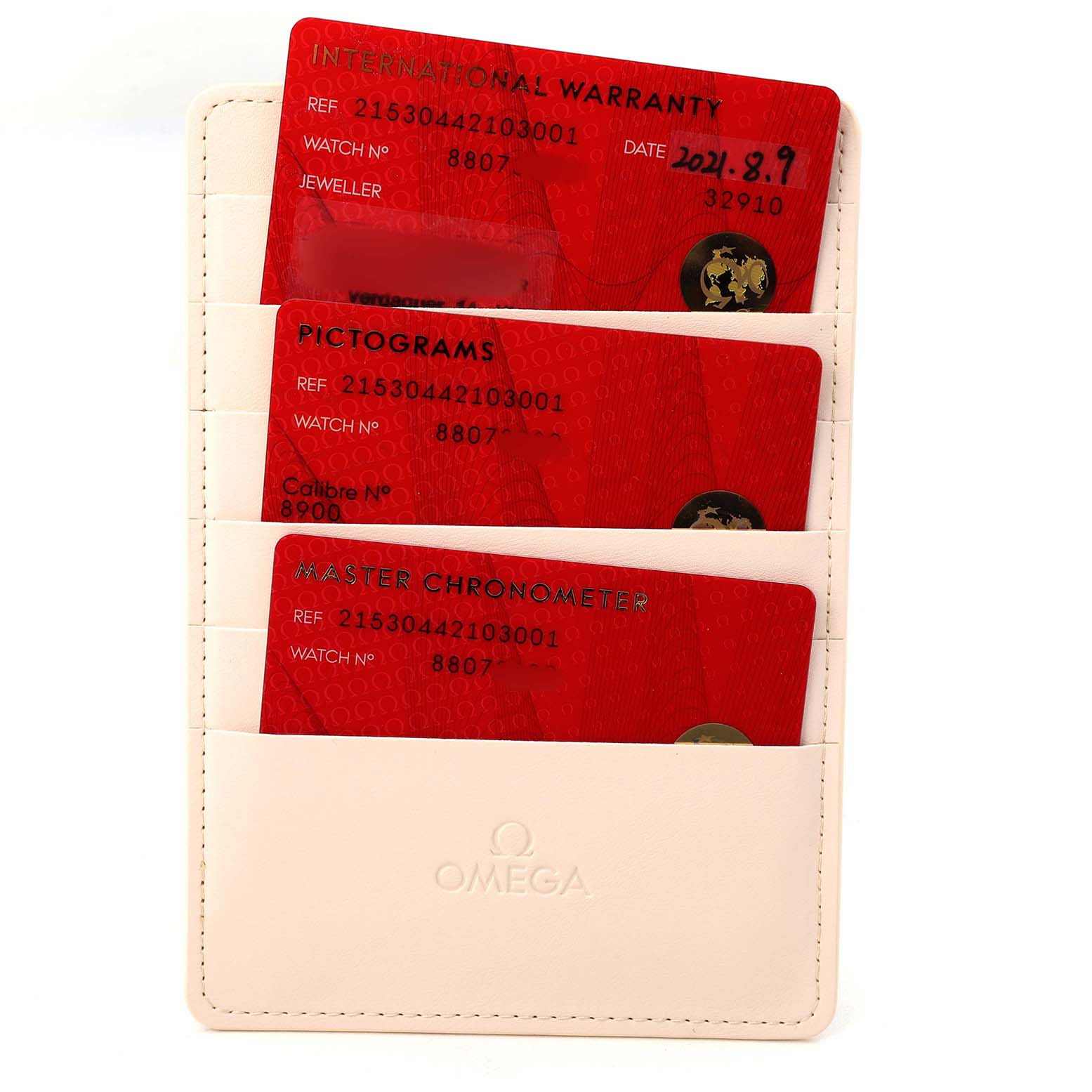 The image shows warranty and certification cards in a holder for an Omega Planet Ocean 215.30.44.21.03.001 Men's Stainless Steel Blue Dial watch.