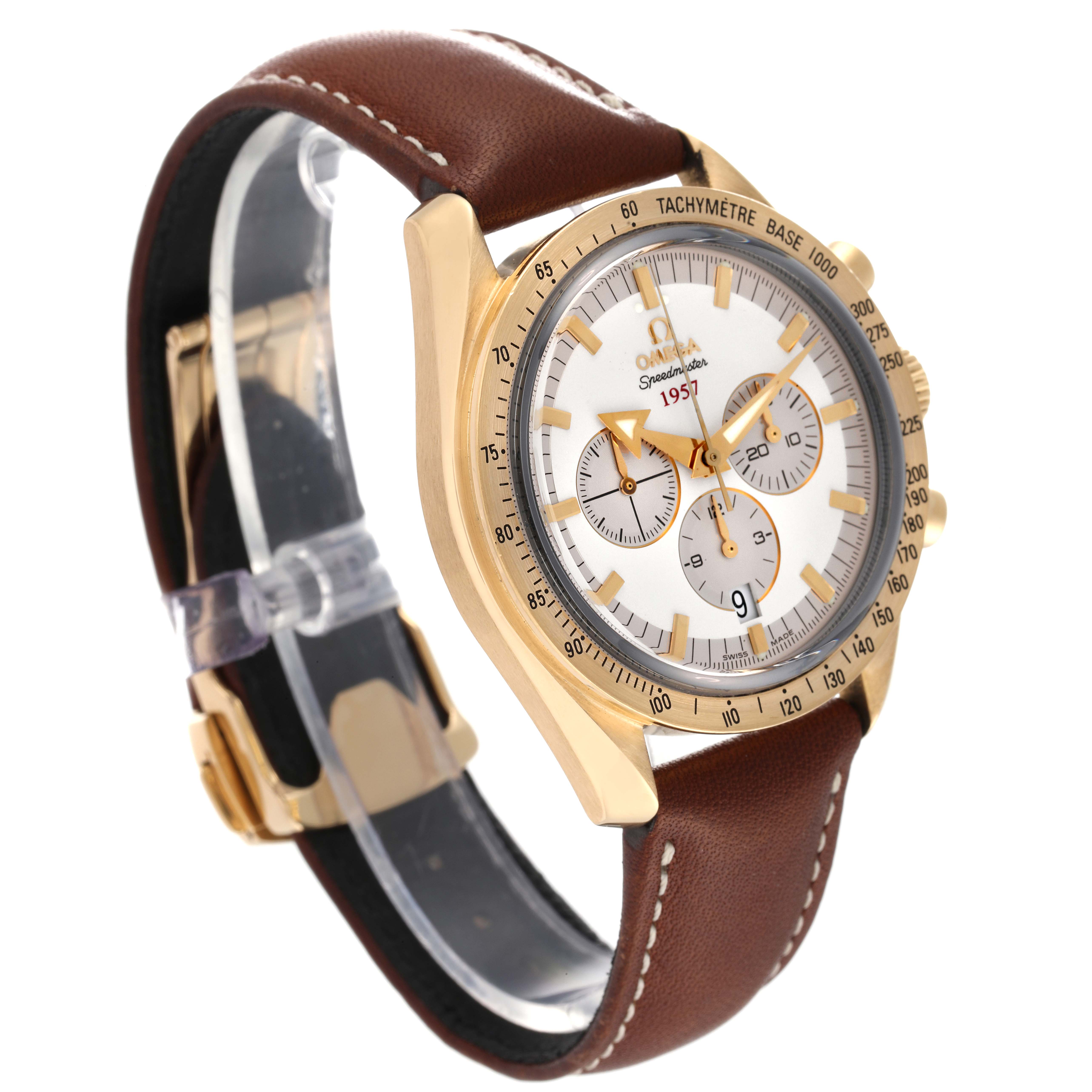The Omega Speedmaster 321.53.42.50.02.001 Men's Yellow Gold Silver Dial 321.53.42.50.02.001 Men's Yellow Gold Silver Dial watch is shown at an angled side view, displaying its brown leather strap, gold case, and tachymeter bezel.