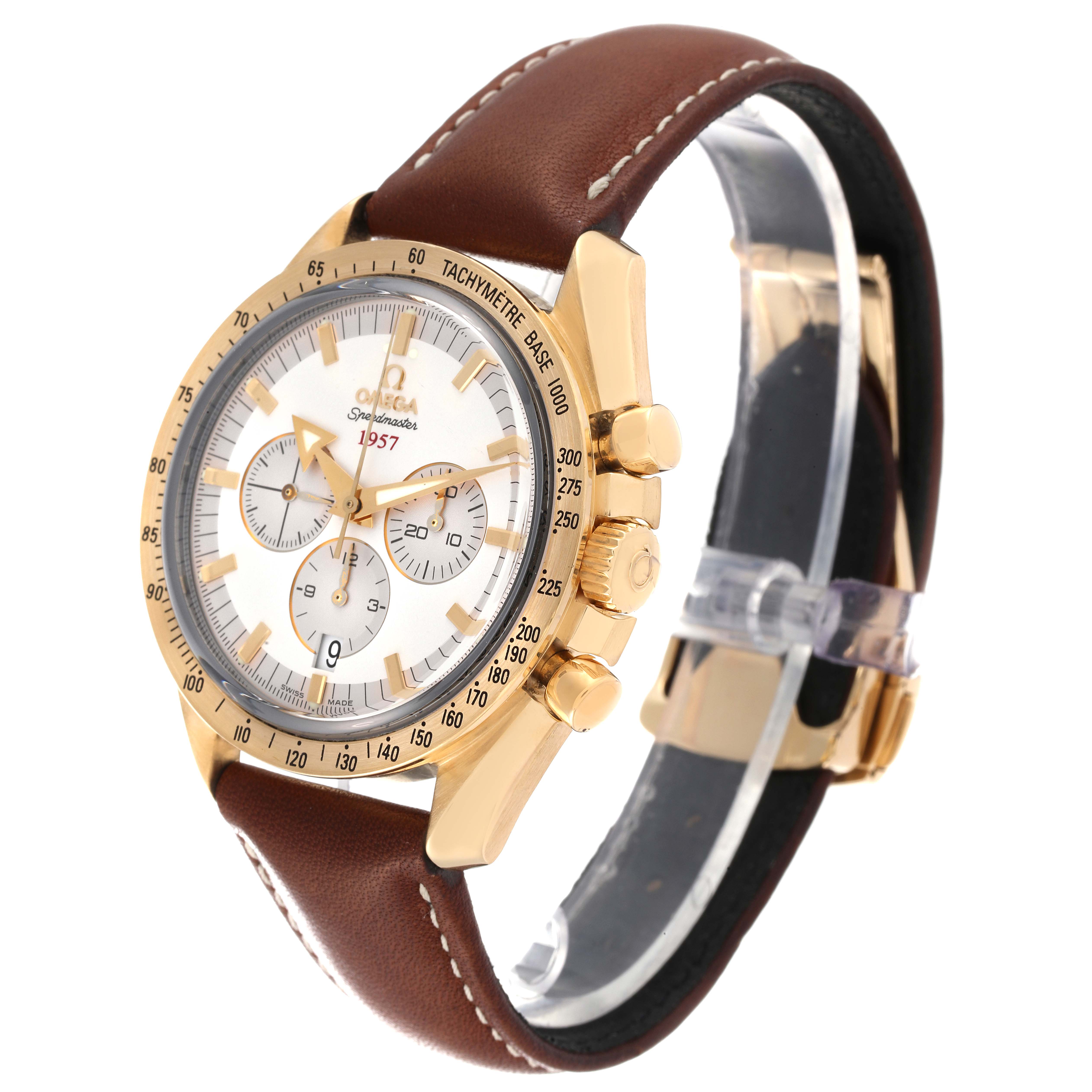 This Omega Speedmaster 321.53.42.50.02.001 Men's Yellow Gold Silver Dial 321.53.42.50.02.001 Men's Yellow Gold Silver Dial watch is shown at an angled view, highlighting its gold case, chronograph dials, and brown leather strap.