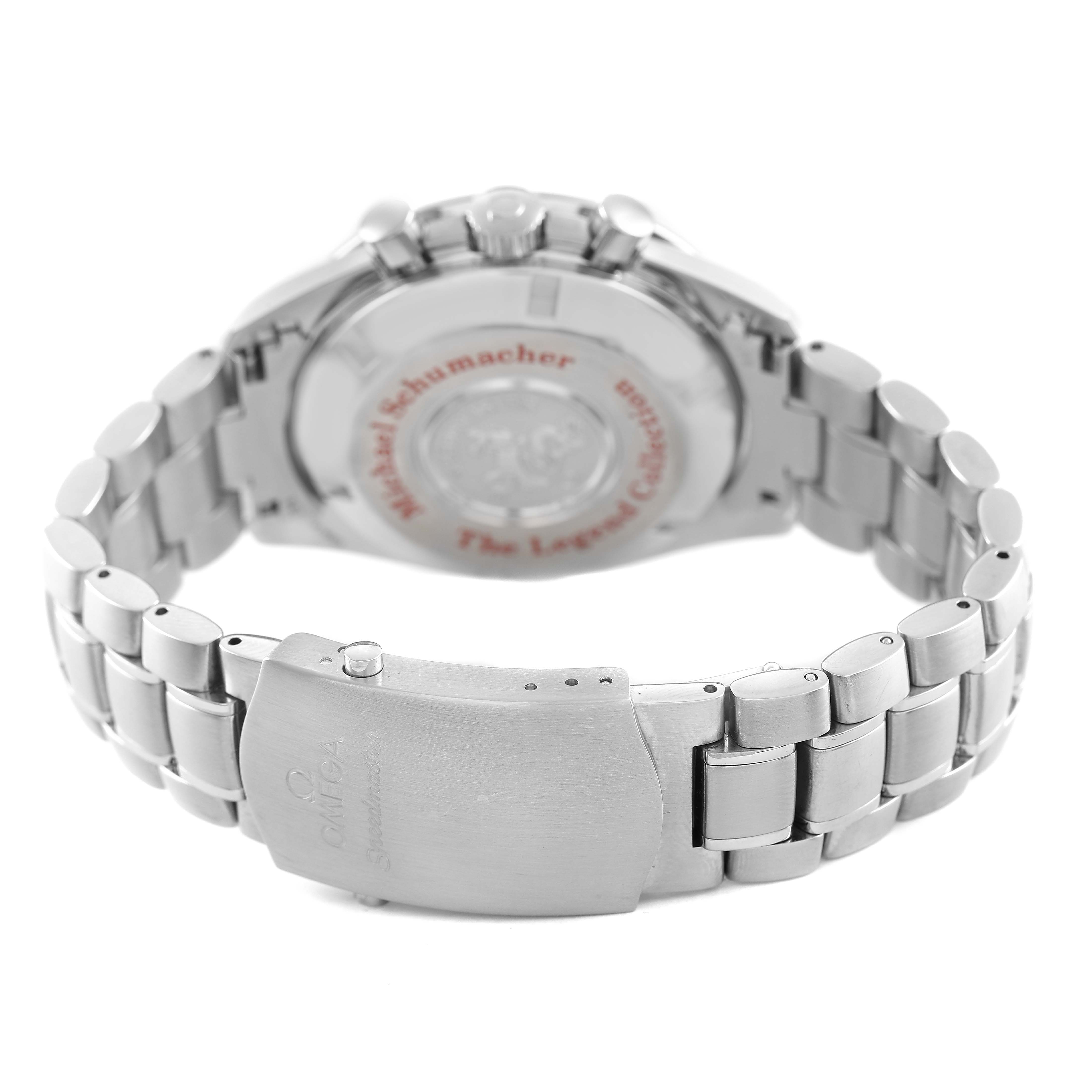The image shows the back and clasp of an Omega Speedmaster 3506.61.00 Men's Stainless Steel Red Dial, including the bracelet and engraved details on the case back.