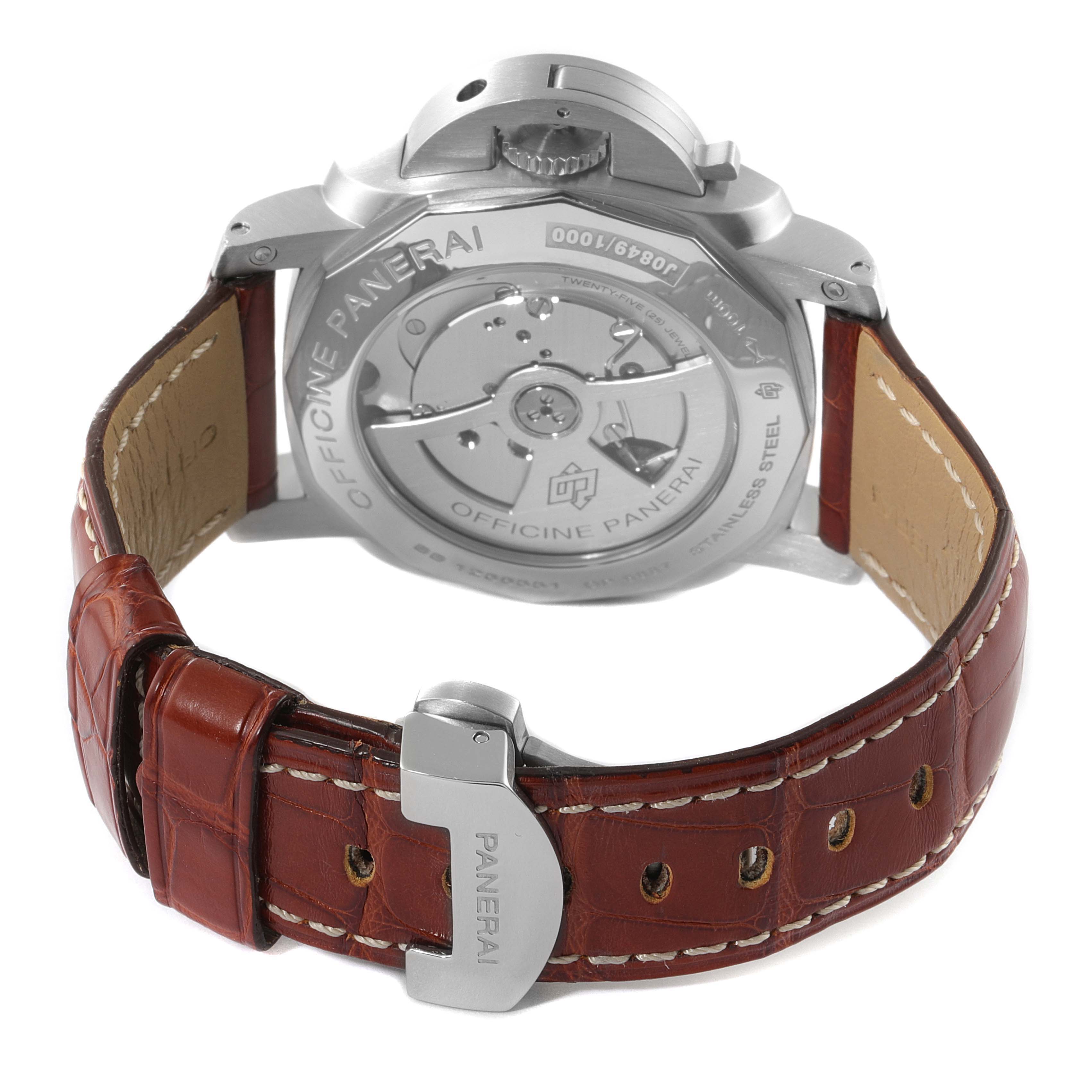 The image shows the backside and clasp of a Panerai Luminor PAM00270 Men's Stainless Steel Black Dial PAM00270 Men's Stainless Steel Black Dial watch, featuring the movement and brown leather strap.