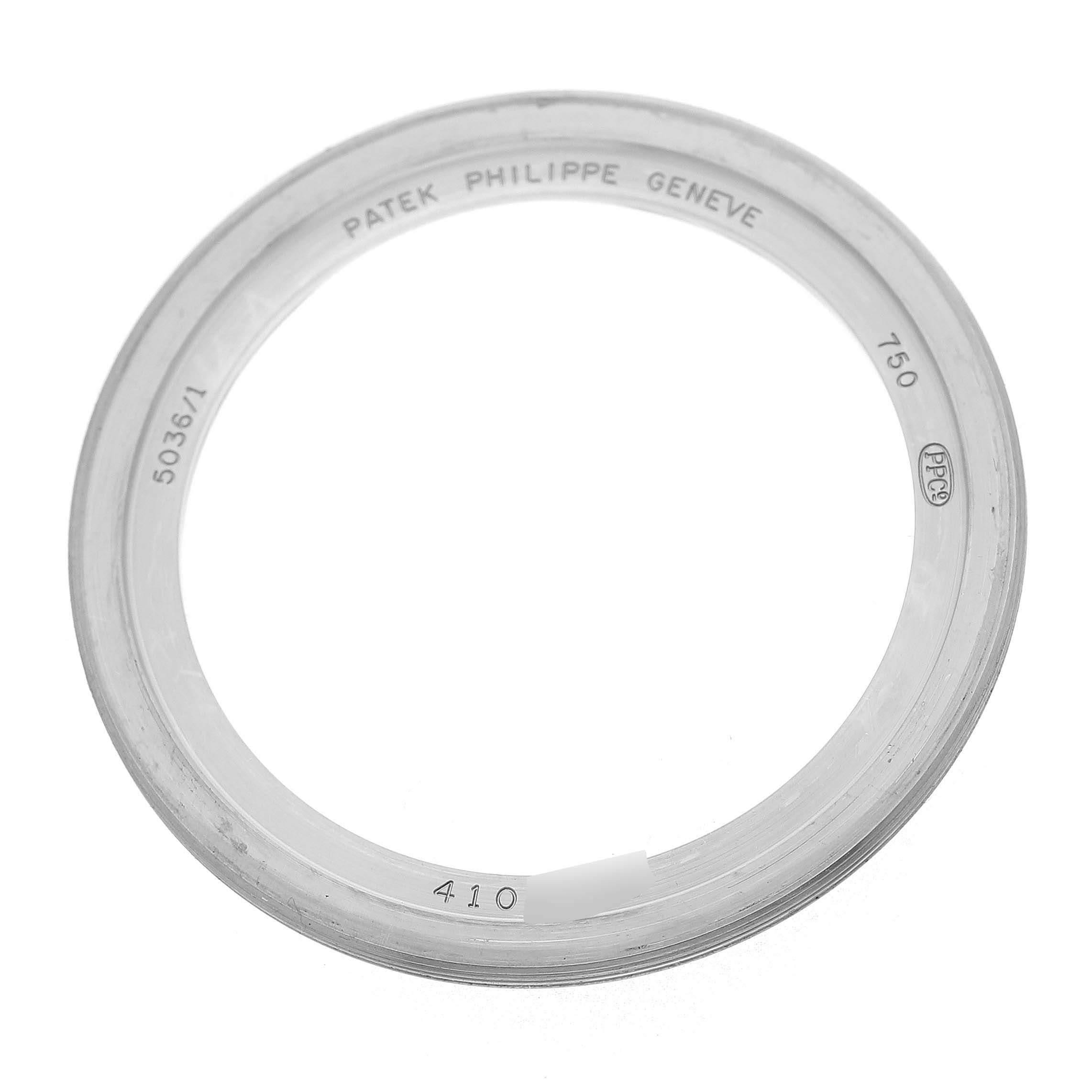 The image shows a top-down view of a bezel for a Patek Philippe Complications 5036/1G-013 Men's White Gold Silver Dial model.