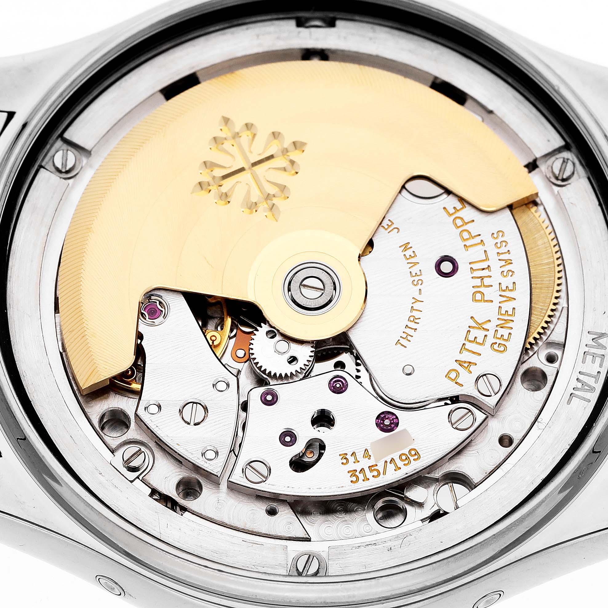 The image shows a close-up of the movement inside the Patek Philippe Complications 5036/1G-013 Men's White Gold Silver Dial watch, highlighting the rotor and inner mechanics.