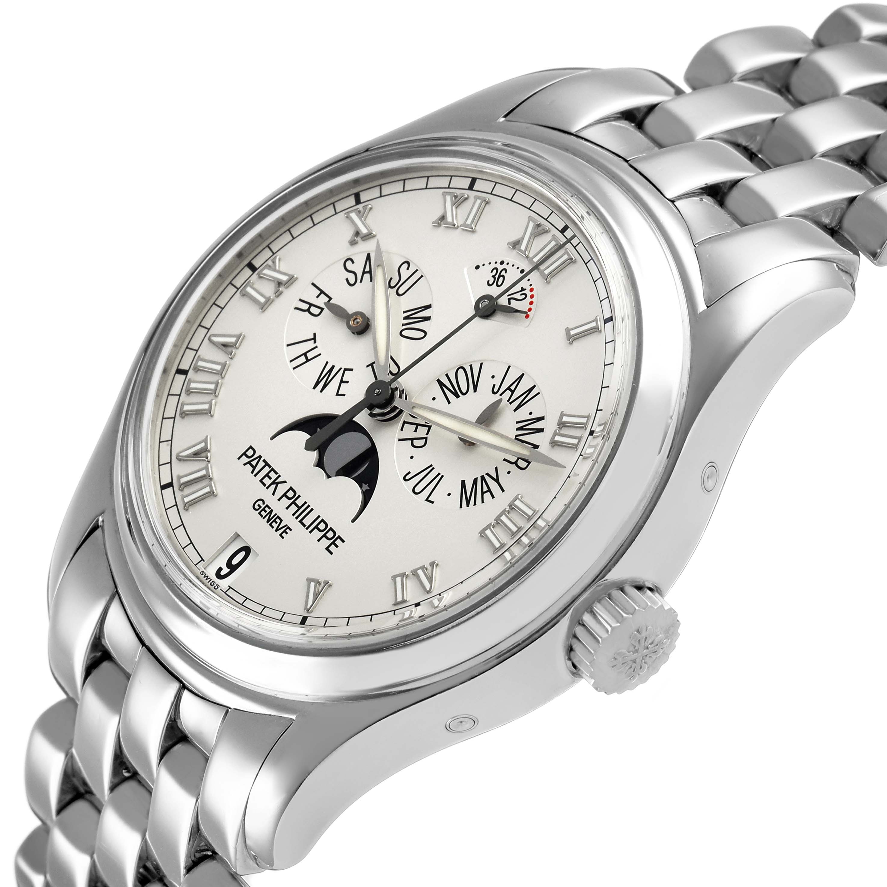 The Patek Philippe Complications 5036/1G-013 Men's White Gold Silver Dial watch is shown at an angled view, highlighting the face, Roman numerals, moon phase, and bracelet.