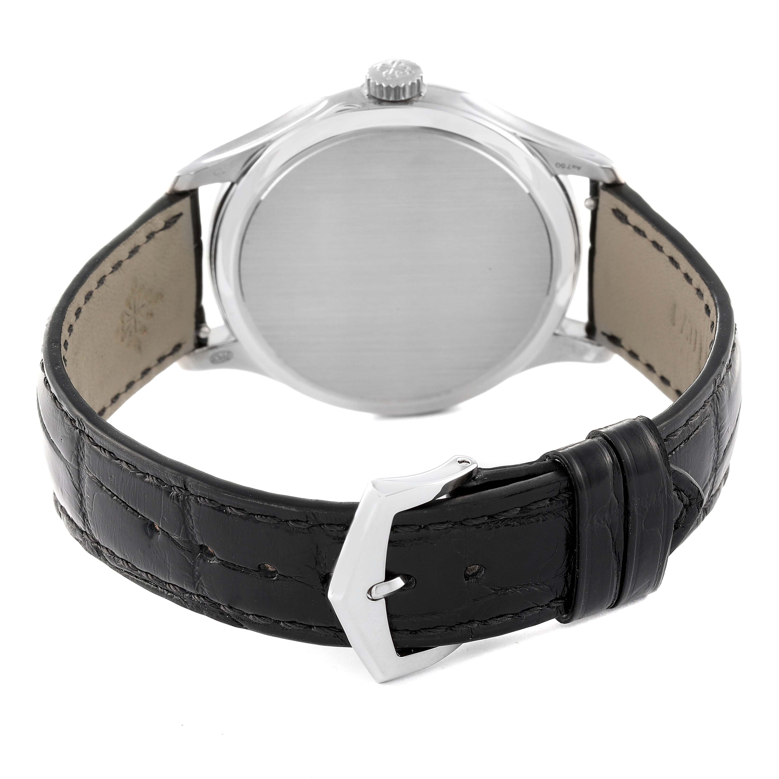 This is a rear view of a Patek Philippe Calatrava 5227G-001 Men's White Gold Beige Dial 5227G-001 Men's White Gold Beige Dial watch showing the case back and leather strap with buckle.
