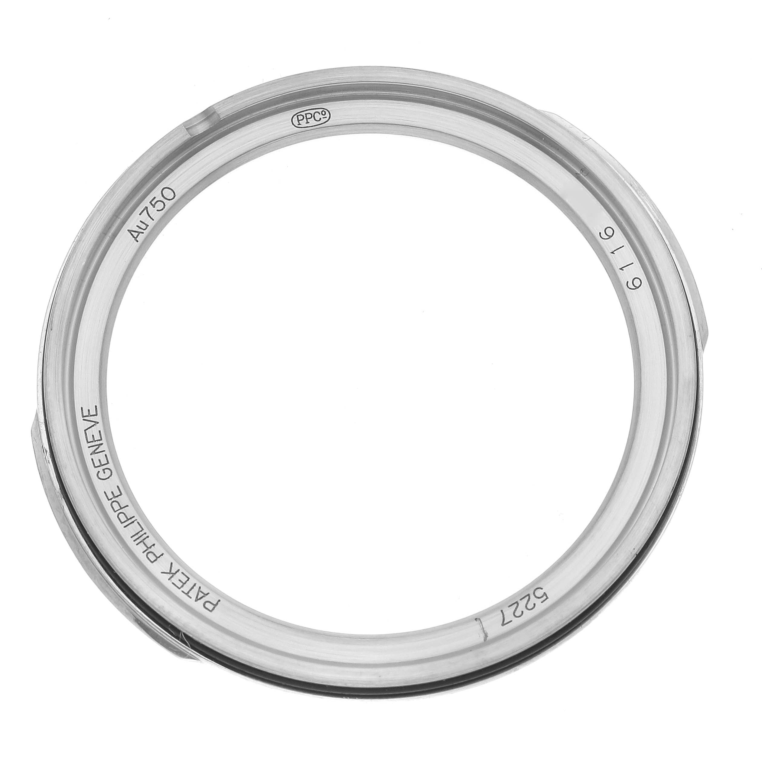 This image shows the bezel of a Patek Philippe Calatrava 5227G-001 Men's White Gold Beige Dial 5227G-001 Men's White Gold Beige Dial watch in an overhead view.