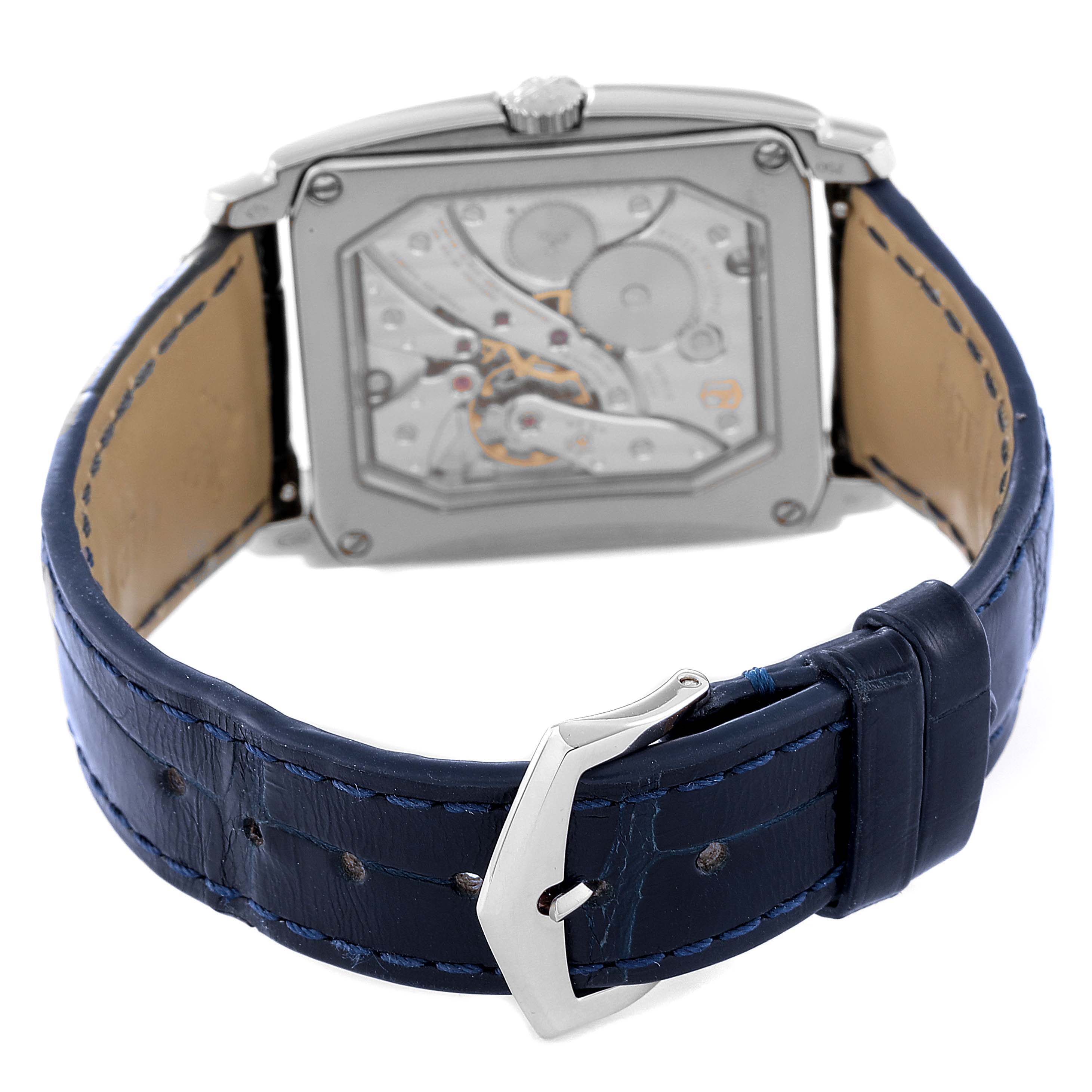 The image shows the back view of the Patek Philippe Gondolo 5124G Men's White Gold Blue Dial 5124G Men's White Gold Blue Dial watch, highlighting the movement and blue leather strap with its buckle.