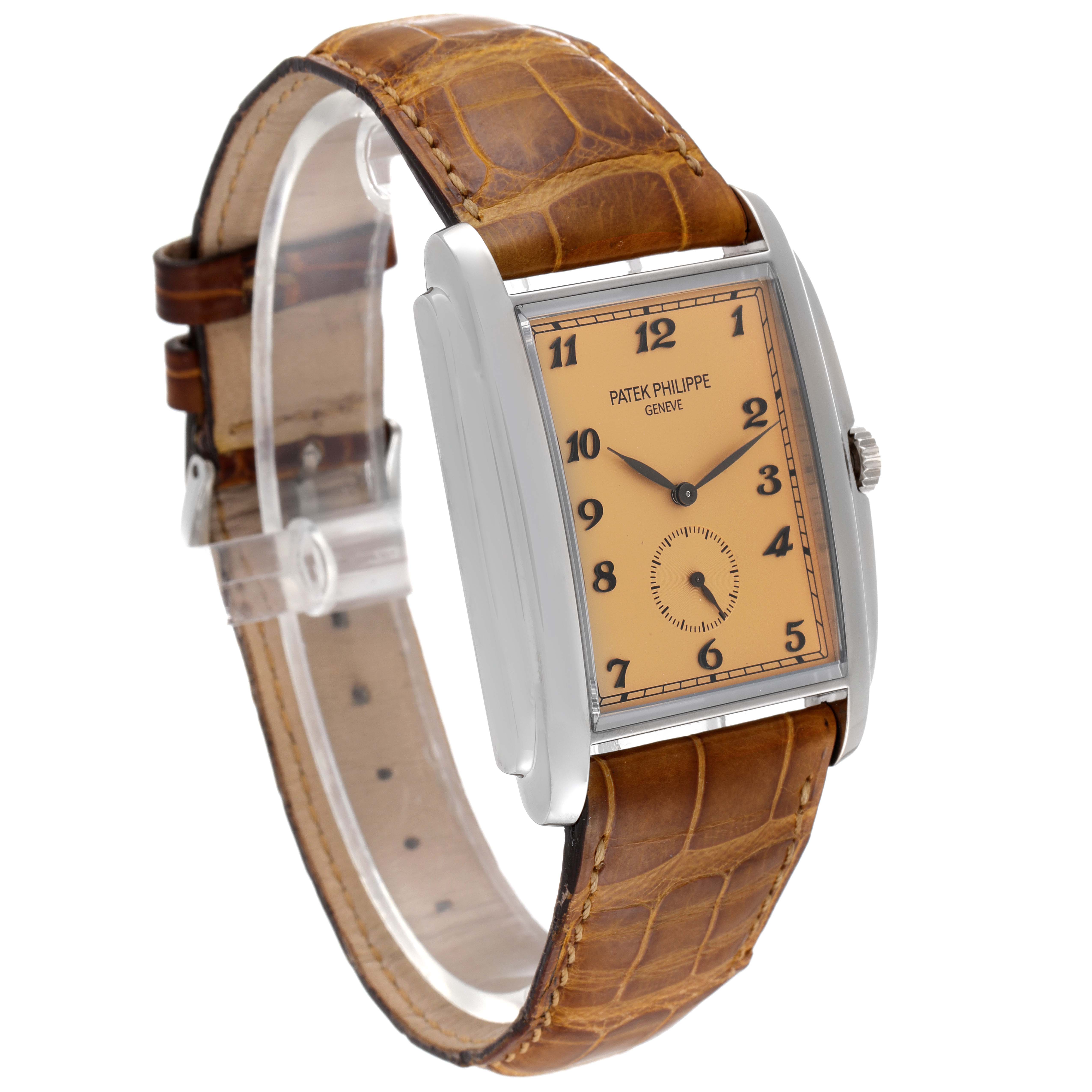 This image shows a Patek Philippe Gondolo 5124G-001 Men's White Gold Pink Dial 5124G-001 Men's White Gold Pink Dial watch at a three-quarter angle, highlighting its rectangular dial and brown leather strap.