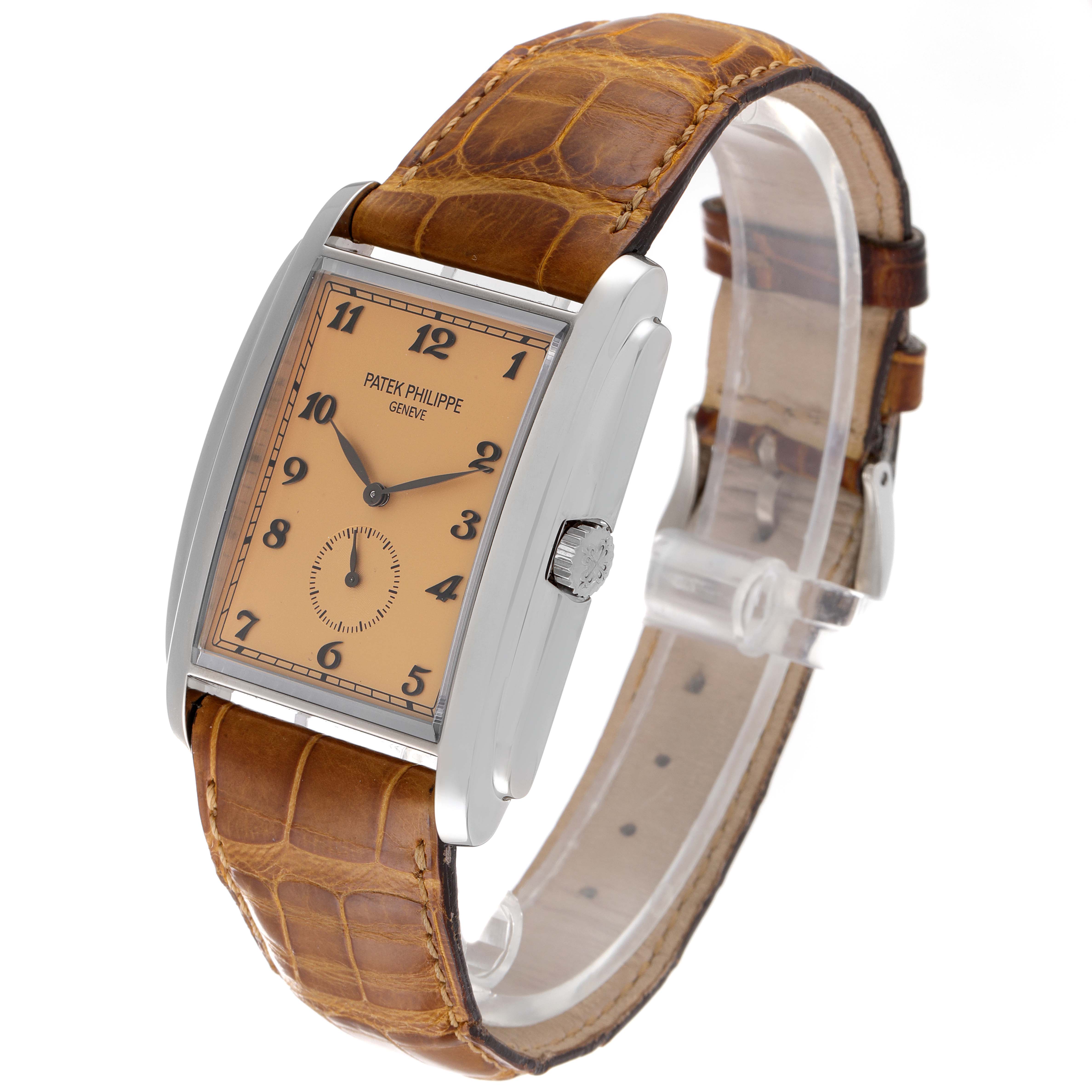 The Patek Philippe Gondolo 5124G-001 Men's White Gold Pink Dial 5124G-001 Men's White Gold Pink Dial watch is shown at a slight angle, highlighting its rectangular dial, leather strap, and crown.