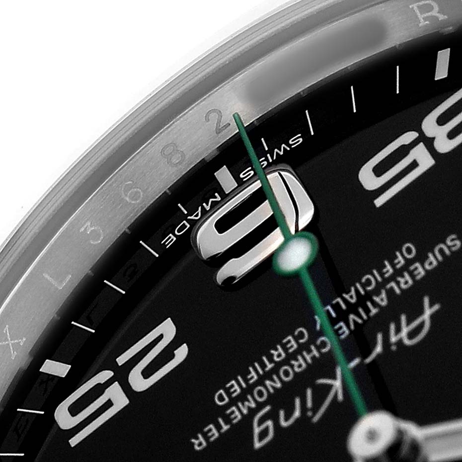 The image shows a close-up of the dial and bezel of the Rolex Air-King 116900 Men's Stainless Steel Black Dial, focusing on the “9” hour marker and part of the second hand.