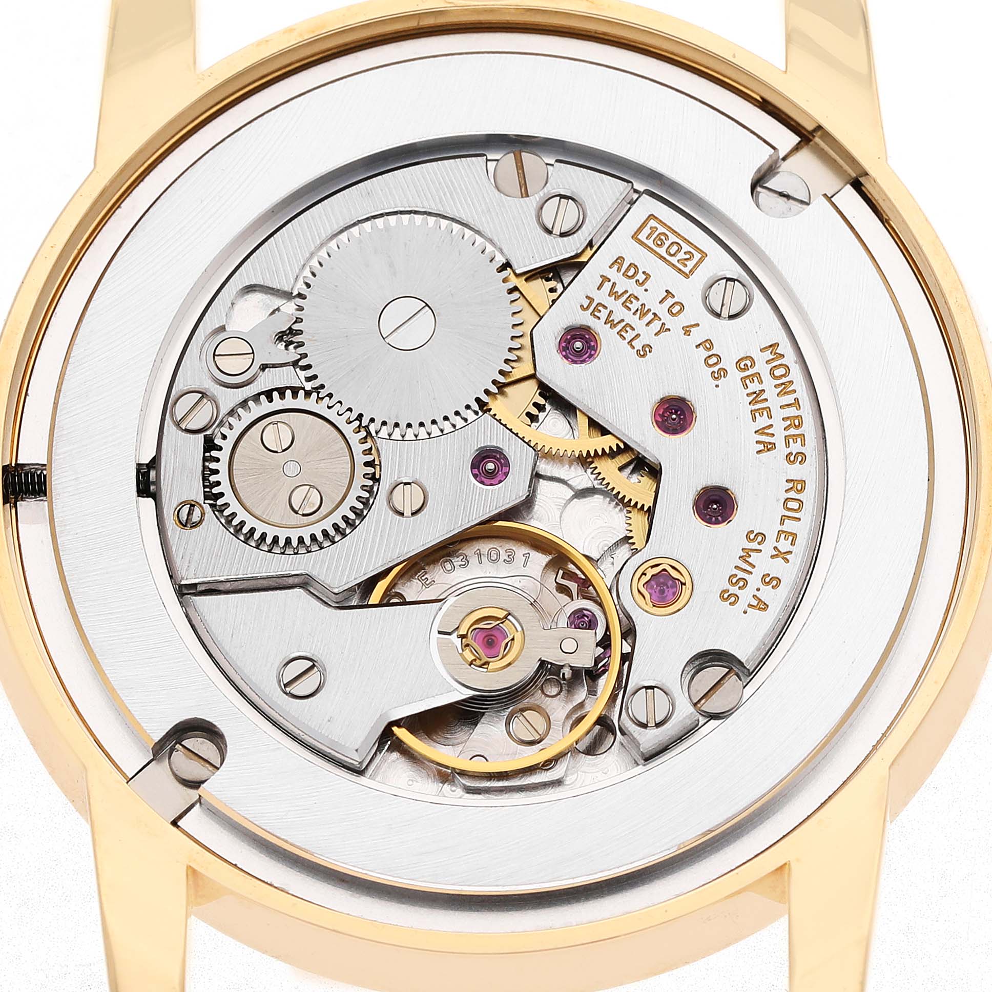 The image shows the movement of a Rolex Cellini 5116 Men's Yellow Gold Grey Dial watch from a rear angle with visible gears and jewels.