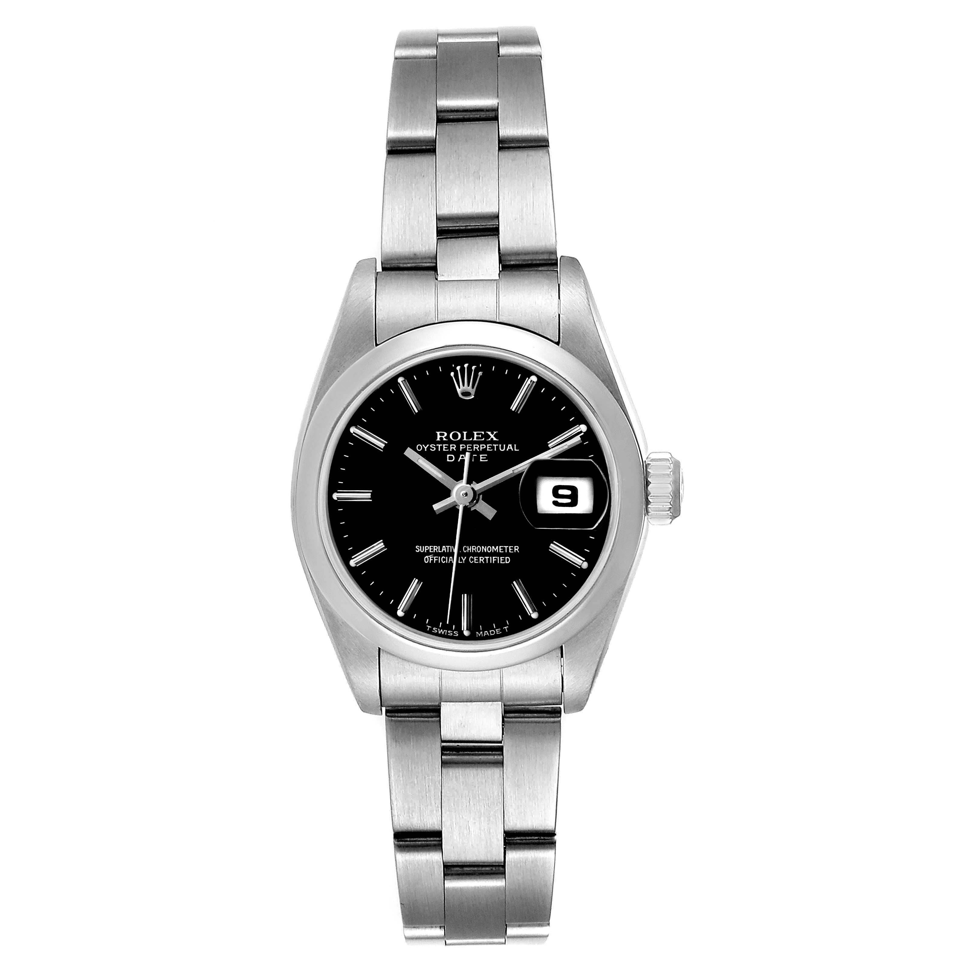 The image shows a front view of a Rolex Oyster Perpetual Date model watch, featuring its black dial, date window, and stainless steel bracelet.