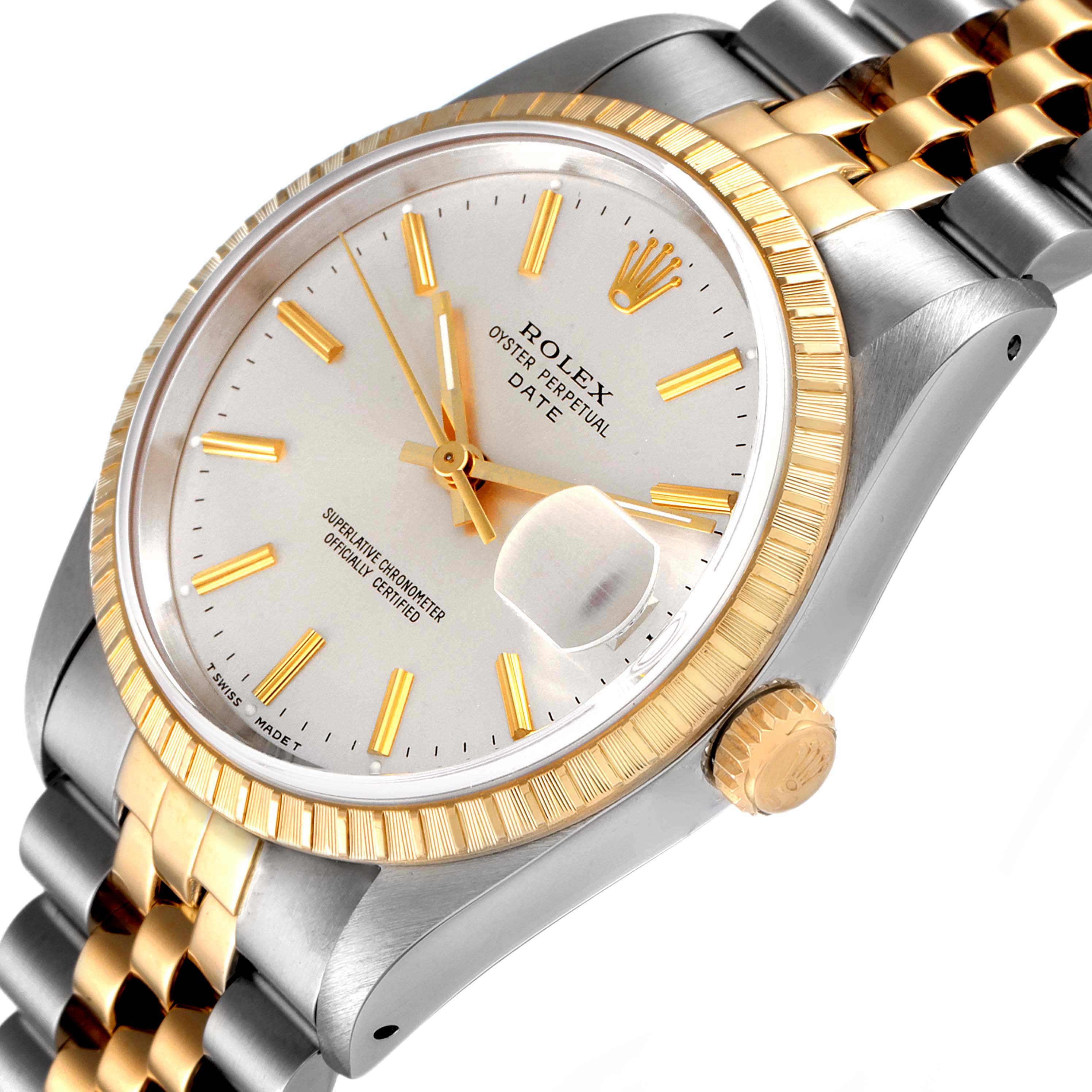This image shows a close-up angled view of a Rolex Date 15223 Men's Steel and Gold (two tone) Silver Dial 15223 Men's Steel and Gold (two tone) Silver Dial model, highlighting the dial, hands, bezel, and crown.