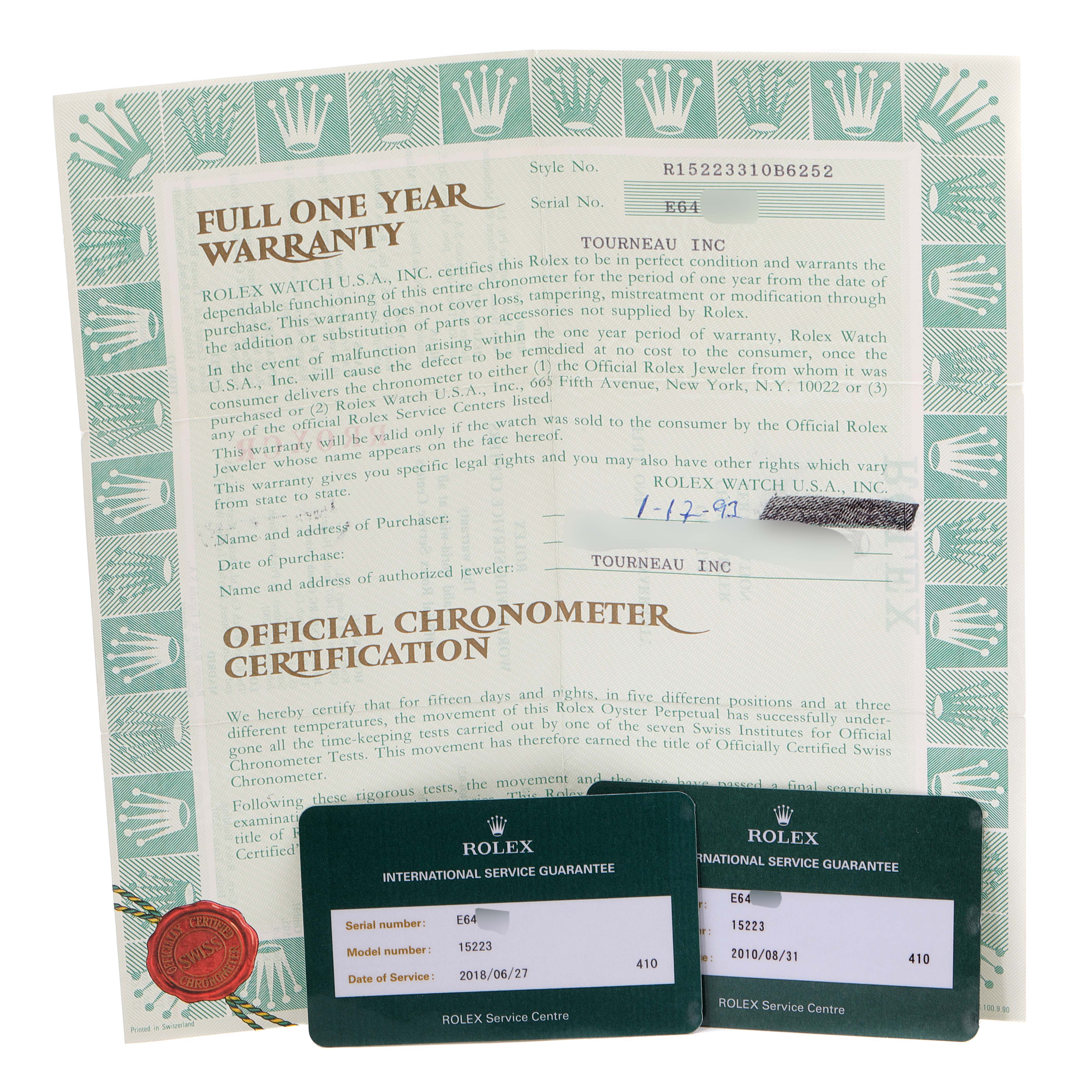 The image shows the warranty and certification for a Rolex Date 15223 Men's Steel and Gold (two tone) Silver Dial 15223 Men's Steel and Gold (two tone) Silver Dial model, along with two international service guarantee cards.