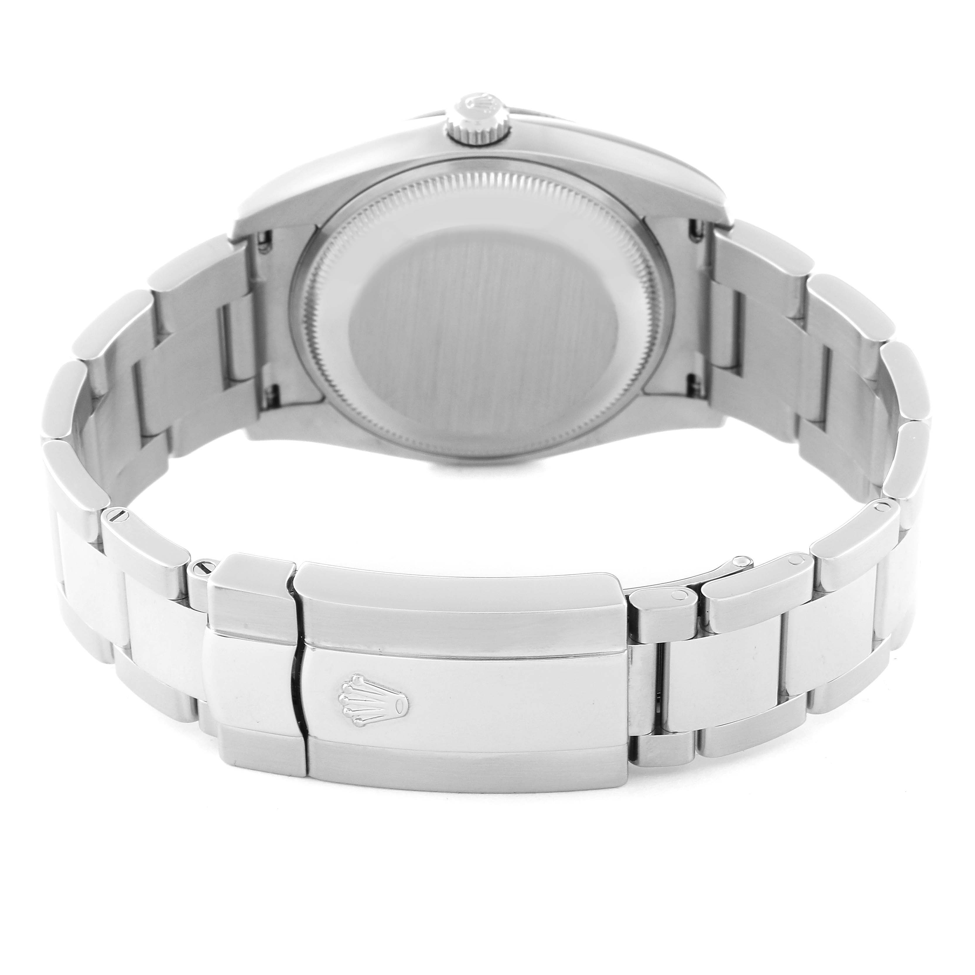 The image shows the back case and clasp of a Rolex Date 115210 Men's Stainless Steel Blue Dial 115210 Men's Stainless Steel Blue Dial model watch.