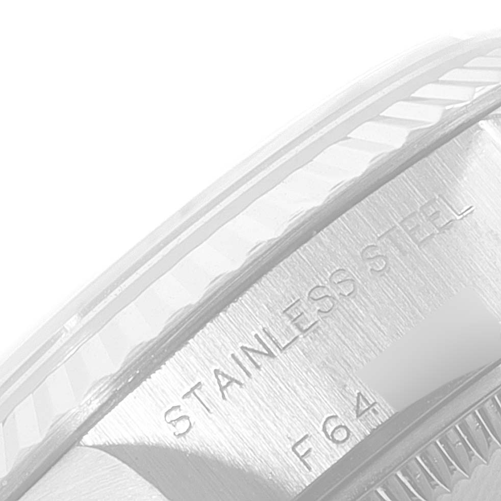 The image shows a close-up of the side of the stainless steel bezel of a Rolex Datejust 79174 Women's Stainless Steel Pink Dial 79174 Women's Stainless Steel Pink Dial watch.