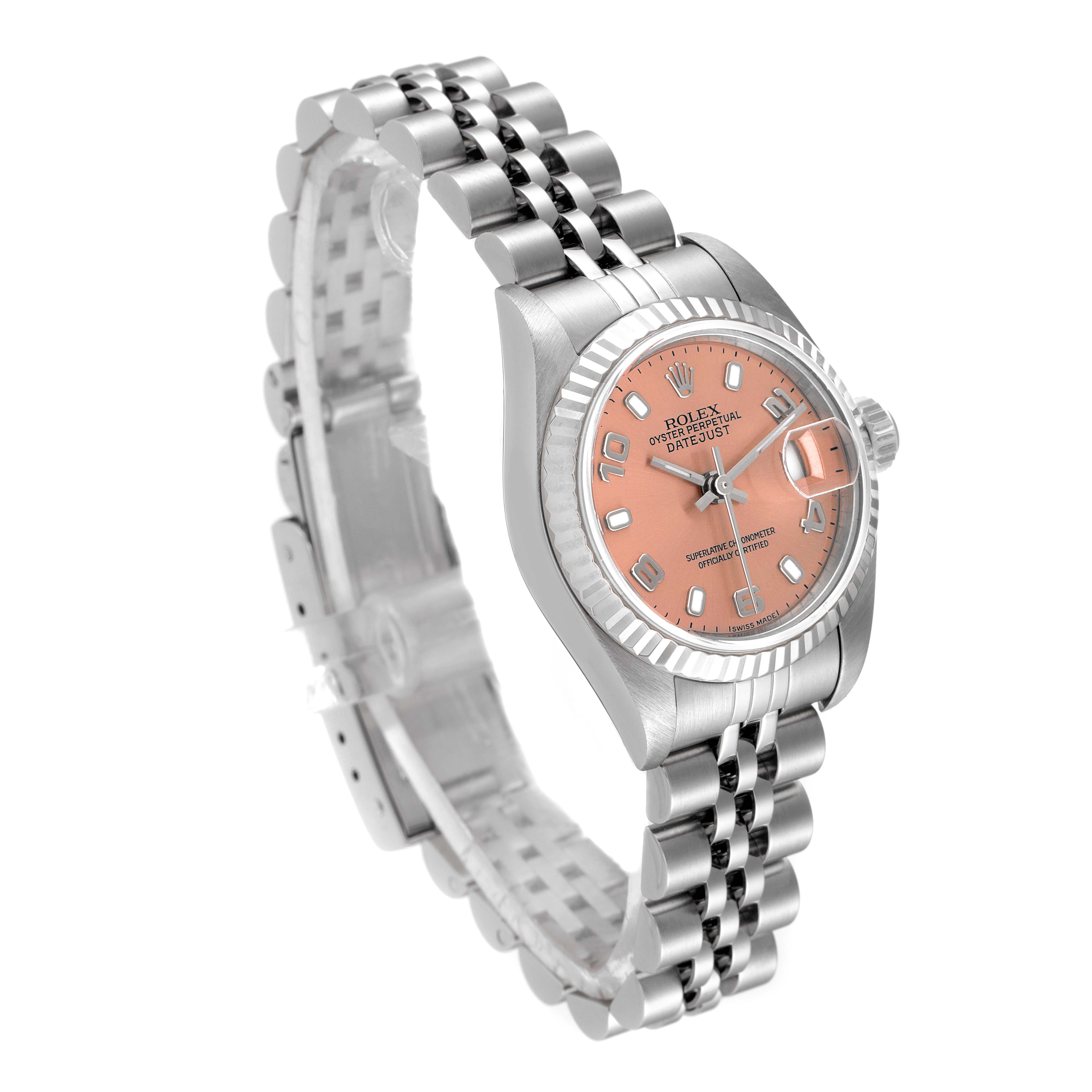 The image shows a side angle of a Rolex Datejust 79174 Women's Stainless Steel Pink Dial 79174 Women's Stainless Steel Pink Dial watch, highlighting its face, bezel, and bracelet.