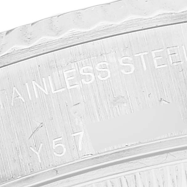The image shows a close-up of the stainless steel casing of a Rolex Datejust 79174 Women's Stainless Steel Mother of Pearl Dial 79174 Women's Stainless Steel Mother of Pearl Dial watch.