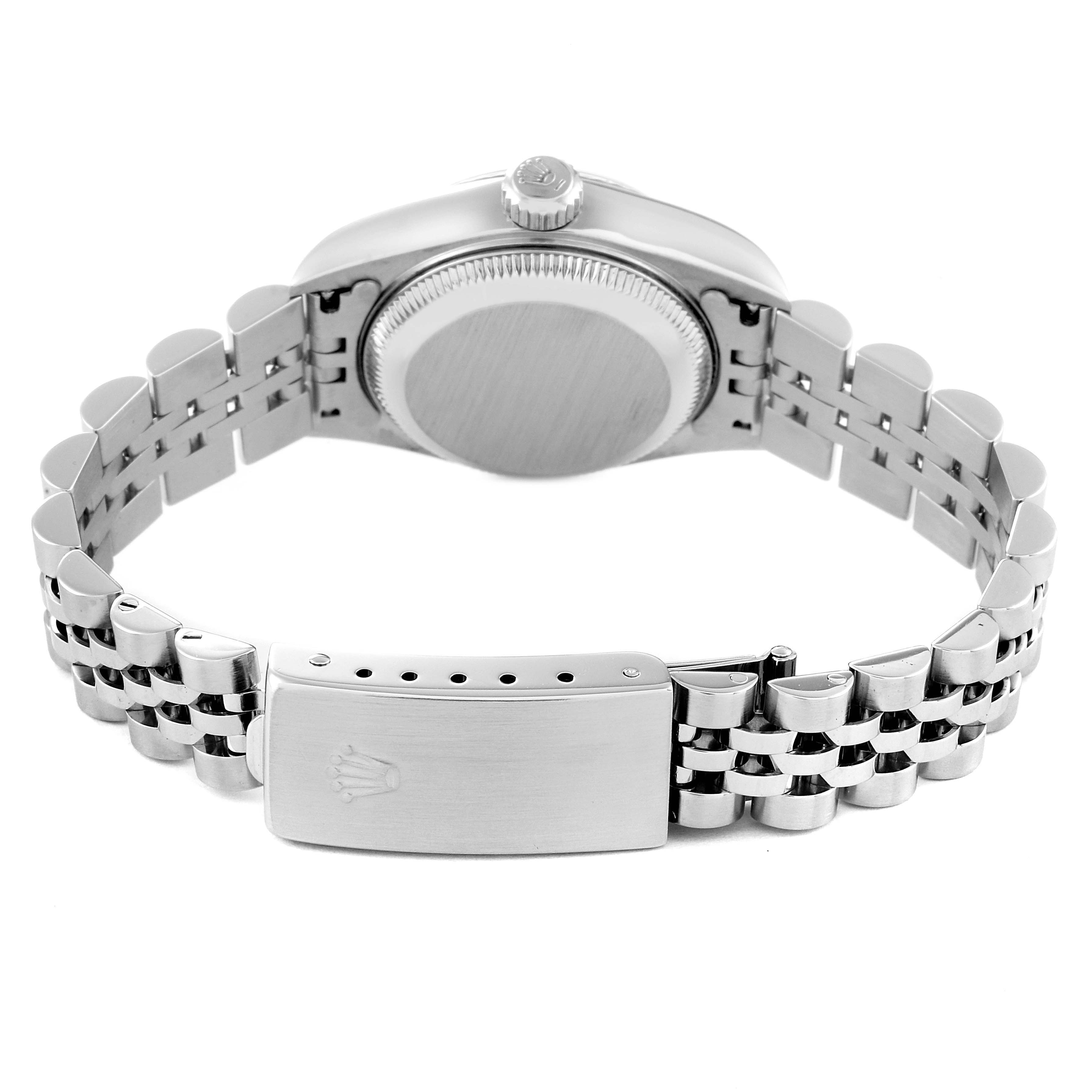 The image shows the back view of a Rolex Datejust 79174 Women's Stainless Steel Mother of Pearl Dial 79174 Women's Stainless Steel Mother of Pearl Dial watch, highlighting the case back and the Jubilee bracelet with clasp.