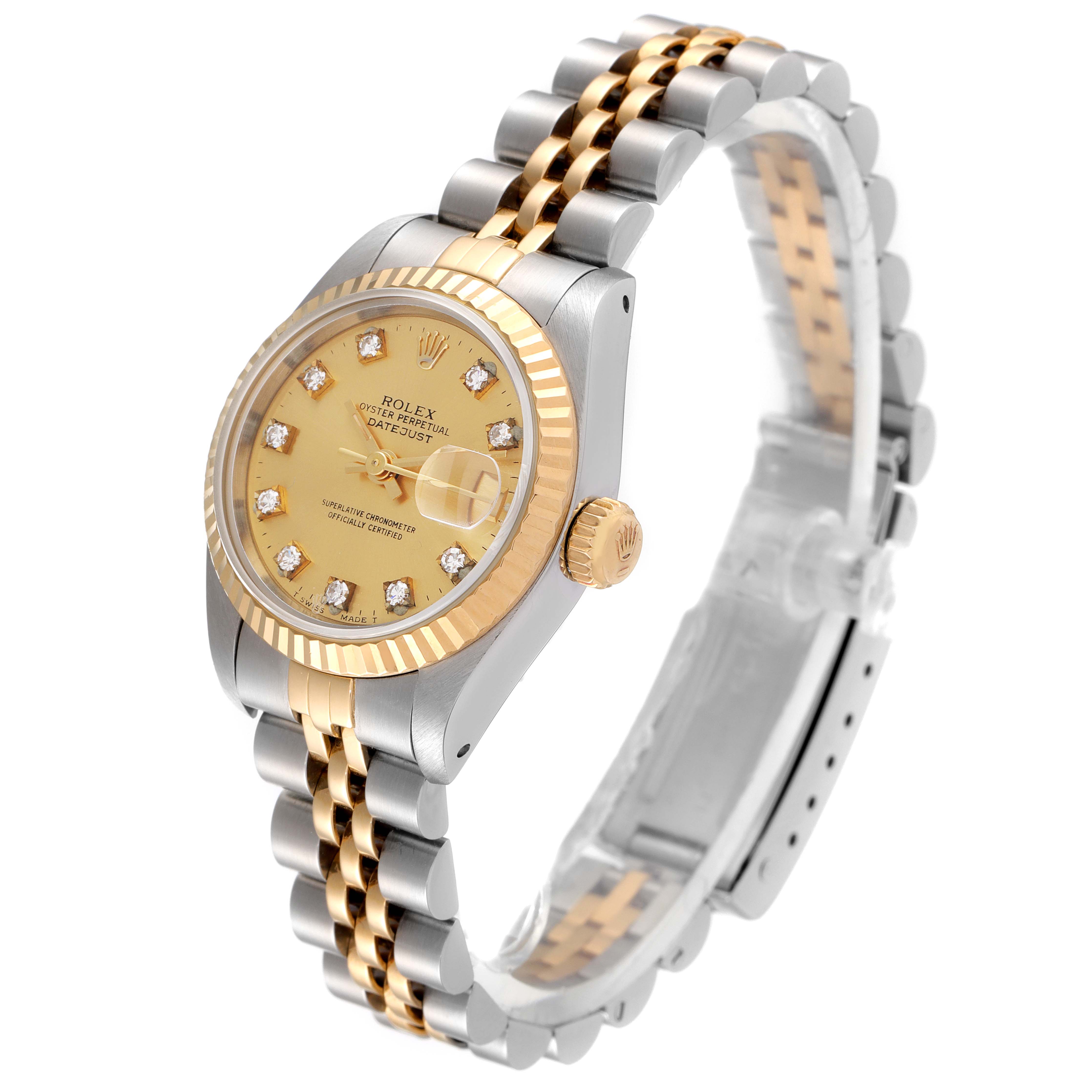 This Rolex Datejust 69173 Women's Steel and Gold (two tone) Champagne Dial 69173 Women's Steel and Gold (two tone) Champagne Dial watch is shown at an oblique angle, highlighting its two-tone bracelet, gold dial, and diamond hour markers.