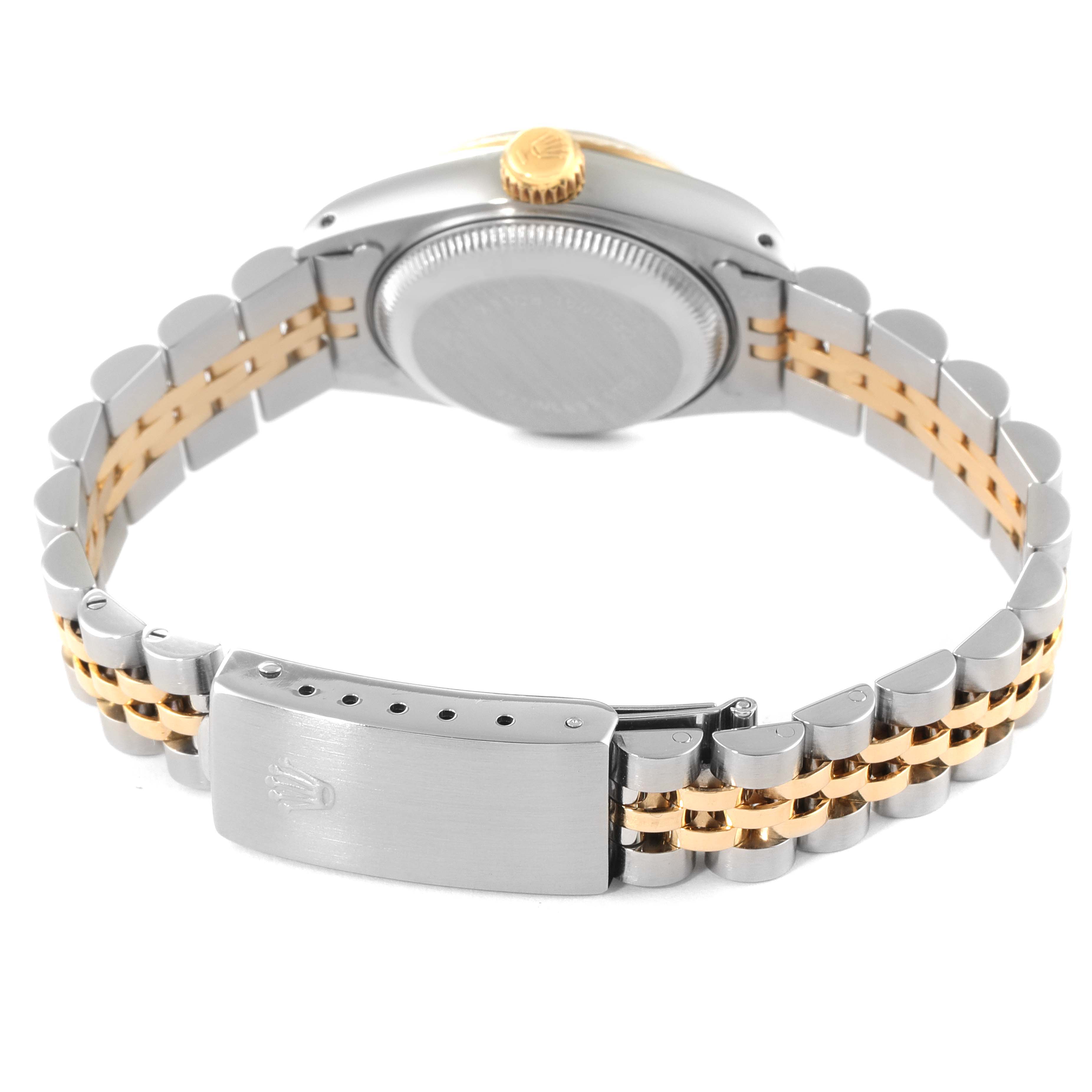 The image shows the back view of a Rolex Datejust 69173 Women's Steel and Gold (two tone) Champagne Dial 69173 Women's Steel and Gold (two tone) Champagne Dial watch focusing on the case back and two-tone bracelet with clasp.