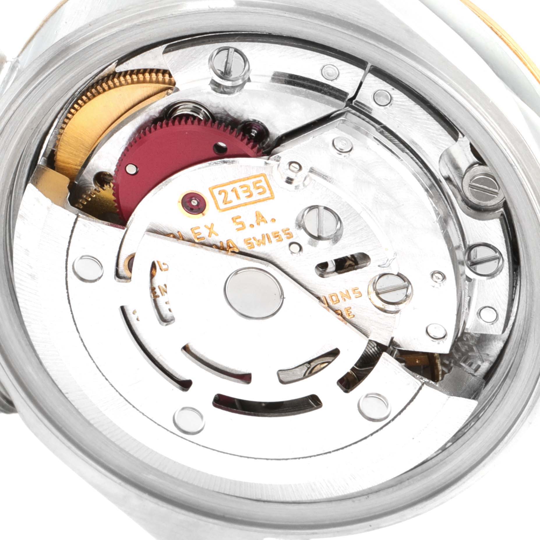 The image shows the inner mechanics of a Rolex Datejust 69173 Women's Steel and Gold (two tone) Champagne Dial 69173 Women's Steel and Gold (two tone) Champagne Dial watch, highlighting its movement components.