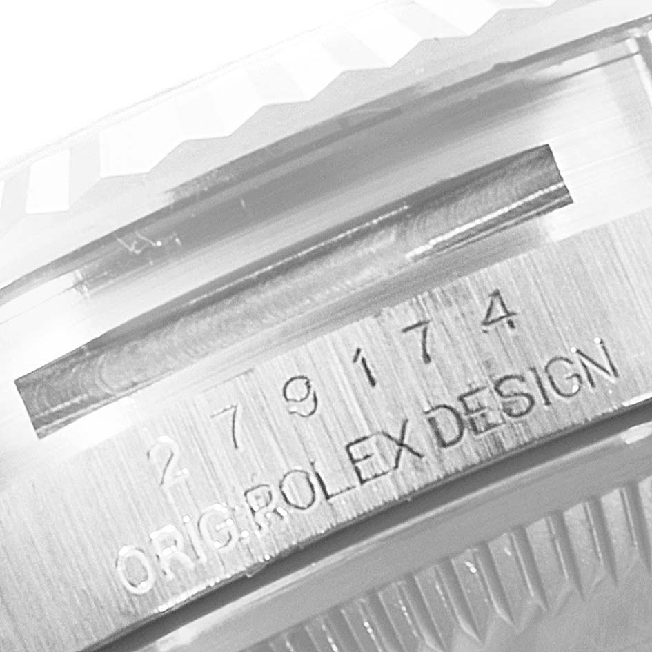 This is a close-up view of the serial number and bezel area of a Rolex Datejust 279174 Women's Stainless Steel Mother of Pearl Dial 279174 Women's Stainless Steel Mother of Pearl Dial watch.