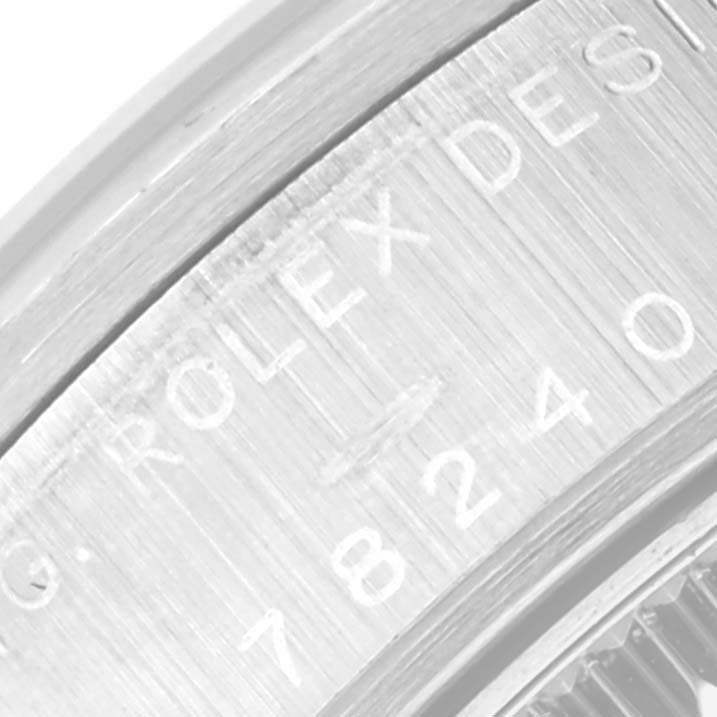 This is a close-up of the bezel inscription on a Rolex Mid-Size 78240 Women's Stainless Steel Pink Dial 78240 Women's Stainless Steel Pink Dial model watch.