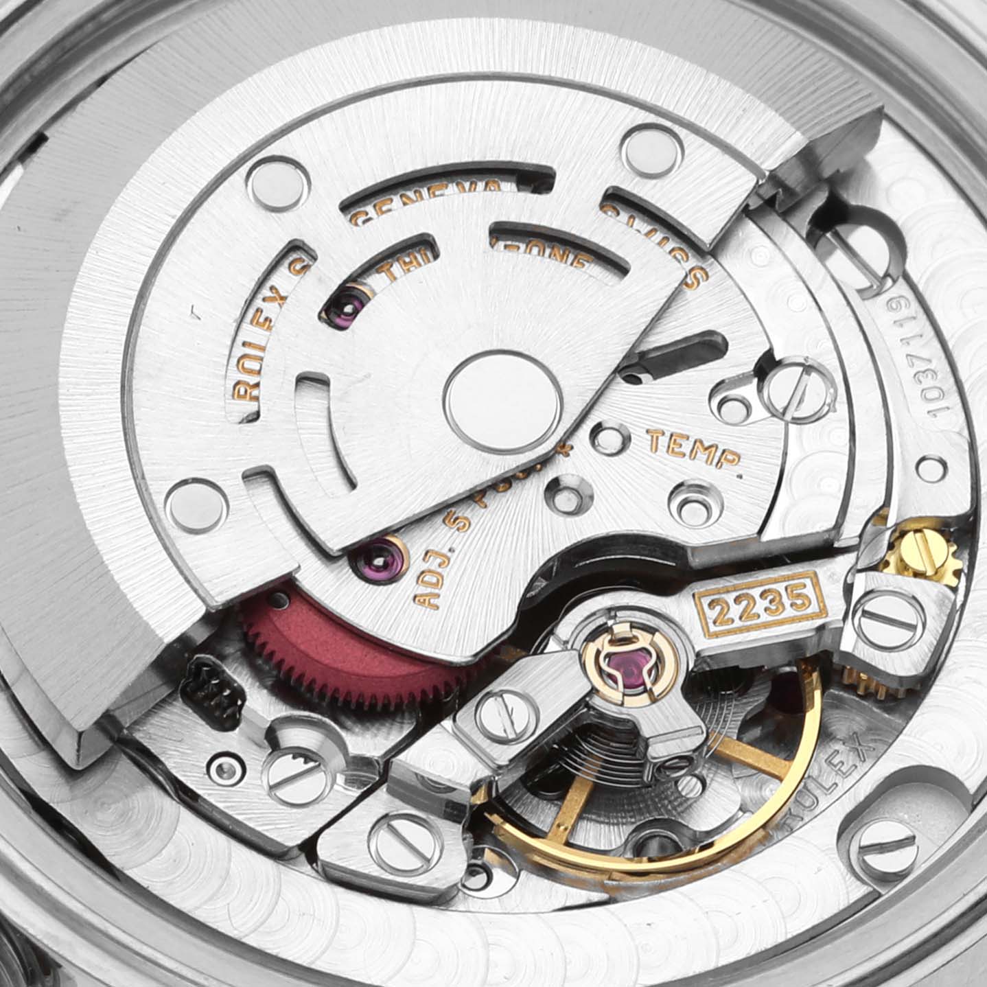 This image shows a close-up view of the movement parts of a Rolex Mid-Size 78240 Women's Stainless Steel Pink Dial 78240 Women's Stainless Steel Pink Dial model watch.