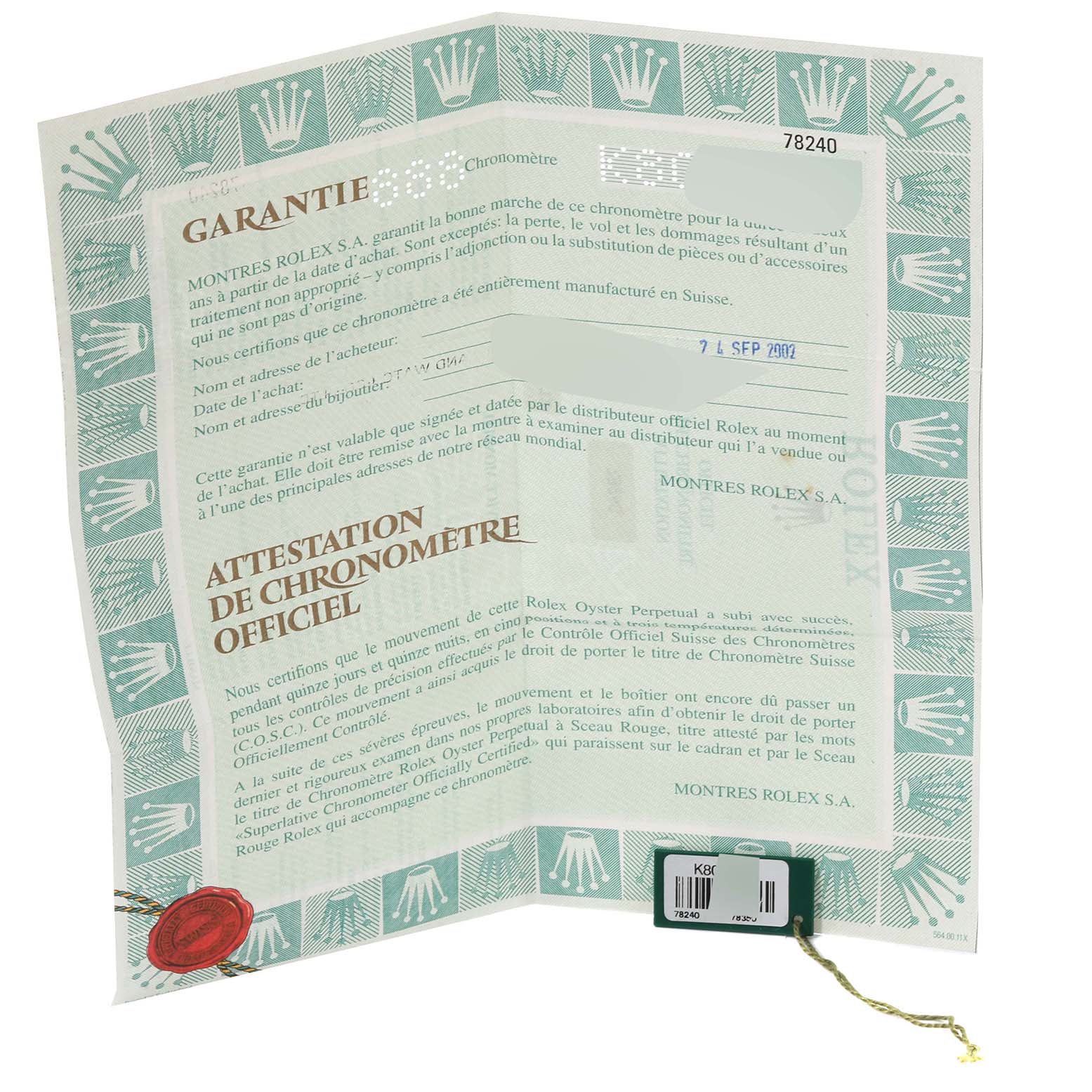 The image displays the warranty card for a Rolex Mid-Size 78240 Women's Stainless Steel Pink Dial 78240 Women's Stainless Steel Pink Dial model watch from a top-down angle.