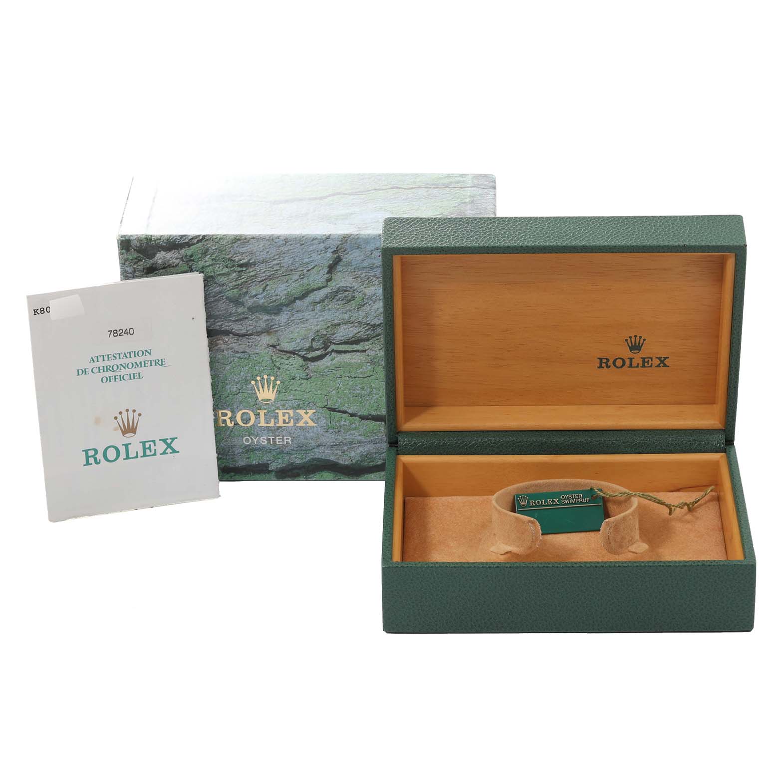 The image shows the packaging, certificate, and an open box for a Mid-Size Rolex watch from an elevated angle.