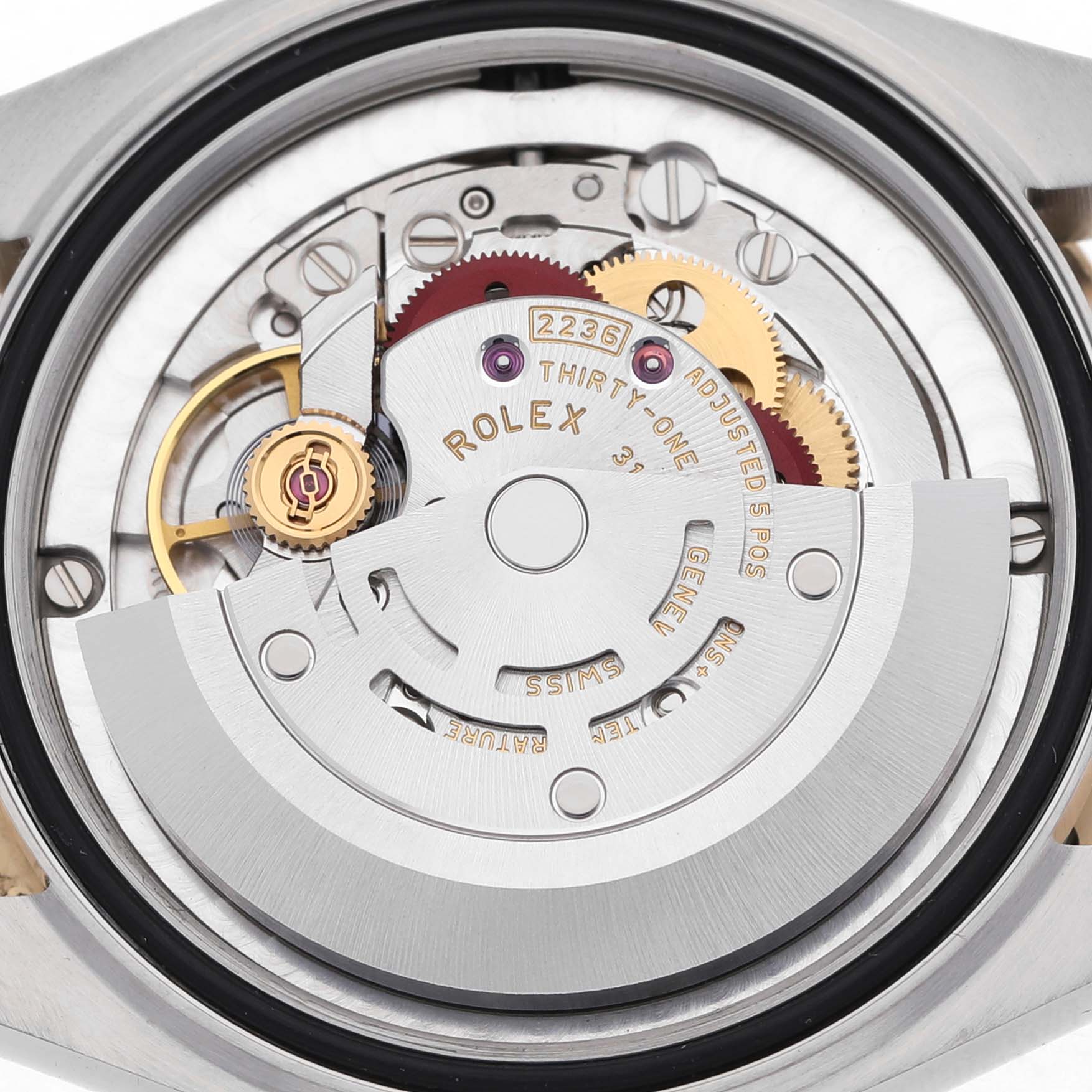 The image shows the internal movement of a Rolex Mid-Size 278343 Women's Steel and Gold (two tone) Grey Dial watch from a top-down angle, highlighting gears and the rotor.