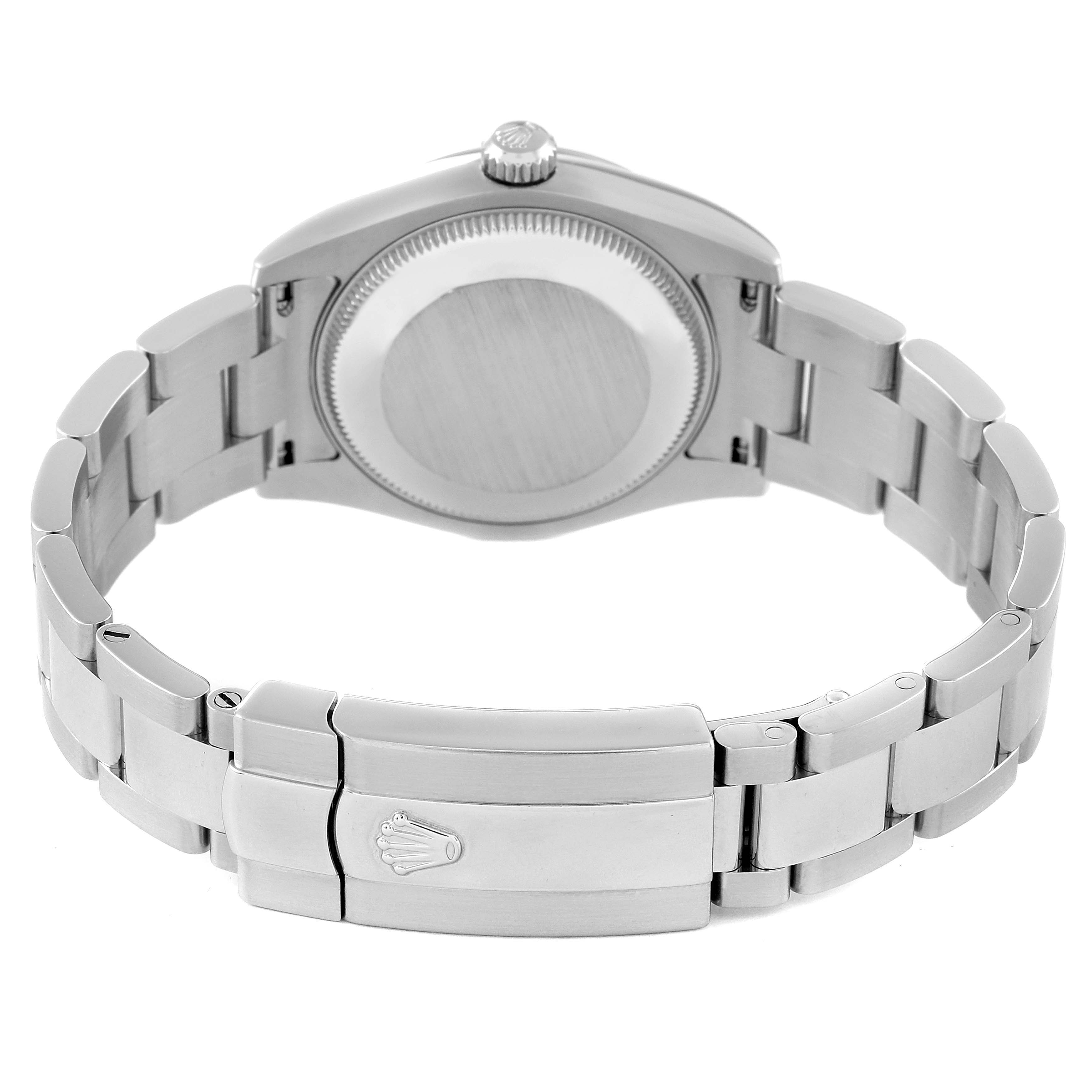 The image shows the back case and clasp of a Mid-Size Rolex watch from a rear angle.