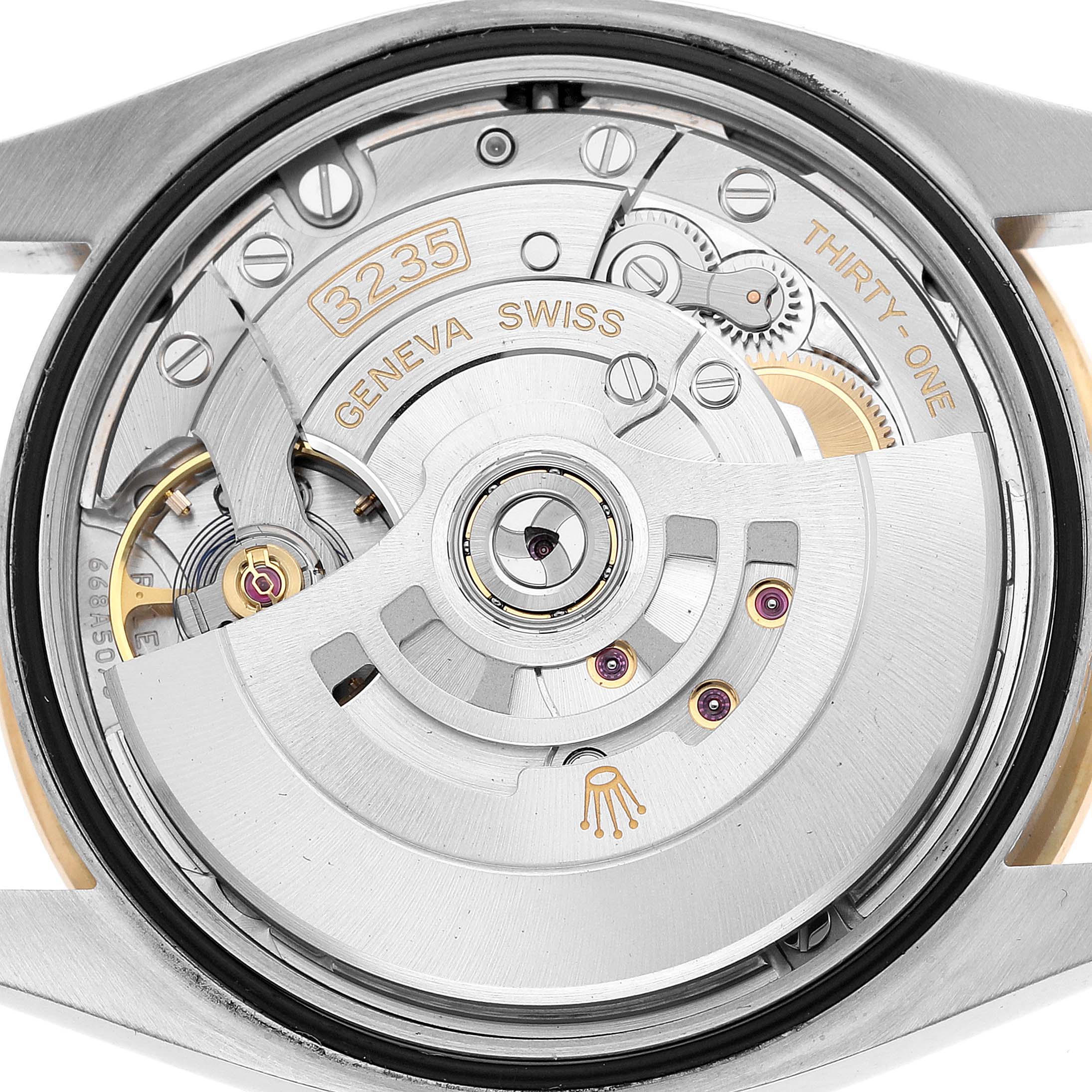 The image shows a Rolex Datejust 126283 Men's Steel and Gold (two tone) Silver Dial watch movement viewed from the back, highlighting the rotor and gears.