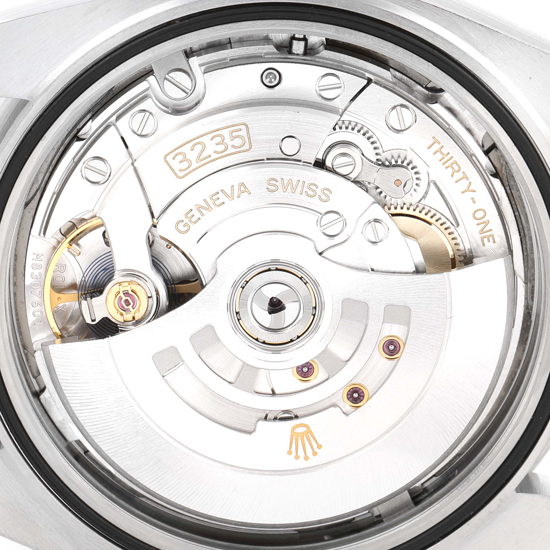 This image shows a close-up view of the movement mechanism of the Rolex Datejust 41 126300 Men
s Stainless Steel Grey Dial 126300 Men
s Stainless Steel Grey Dial model, including gears and the rotor.