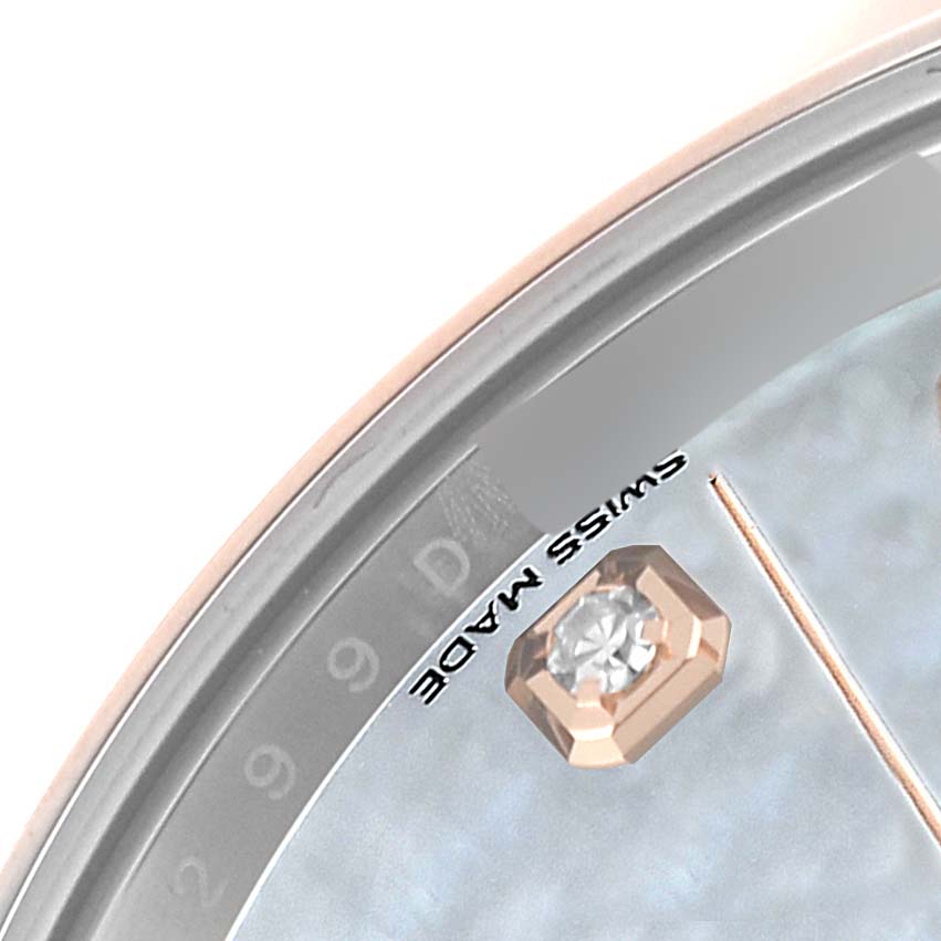 The image shows a close-up of the dial and bezel of the Rolex Datejust 41 126301 Men's Steel and Gold (two tone) Mother of Pearl Dial 126301 Men's Steel and Gold (two tone) Mother of Pearl Dial, highlighting the date window, diamond hour marker, and "SWISS MADE" inscription.