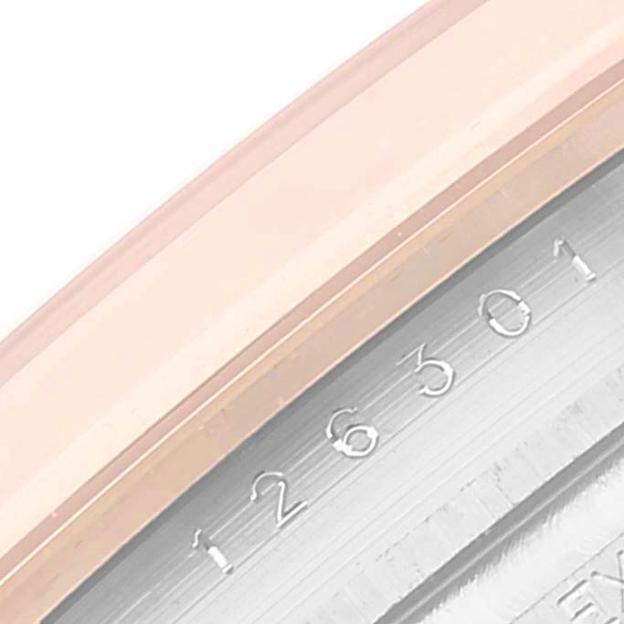 The image shows a close-up angle of the bezel and part of the inner case of the Rolex Datejust 41 126301 Men's Steel and Gold (two tone) Mother of Pearl Dial 126301 Men's Steel and Gold (two tone) Mother of Pearl Dial model, revealing the engraved model number.