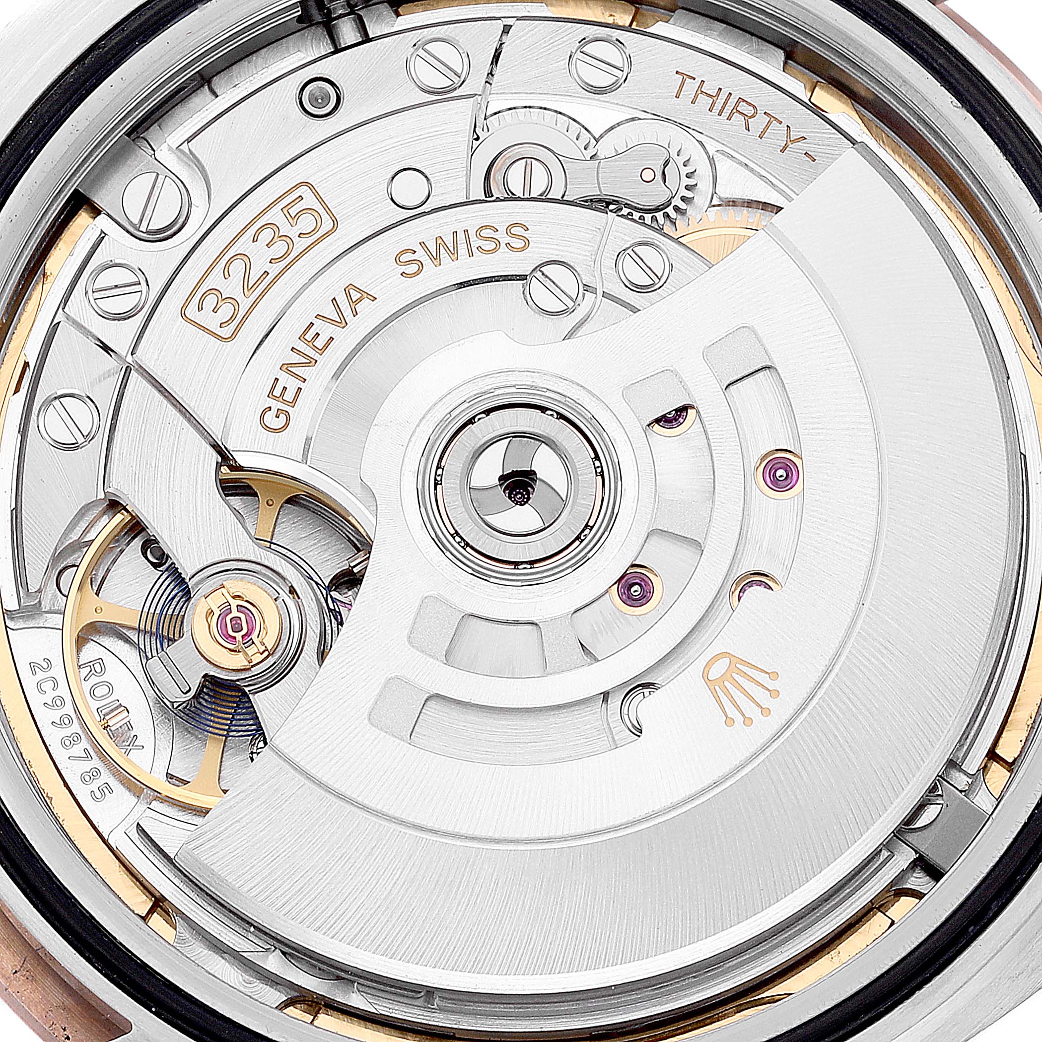 This image shows a close-up view of the movement and internal mechanism of the Rolex Datejust 41 126301 Men's Steel and Gold (two tone) Mother of Pearl Dial 126301 Men's Steel and Gold (two tone) Mother of Pearl Dial model.