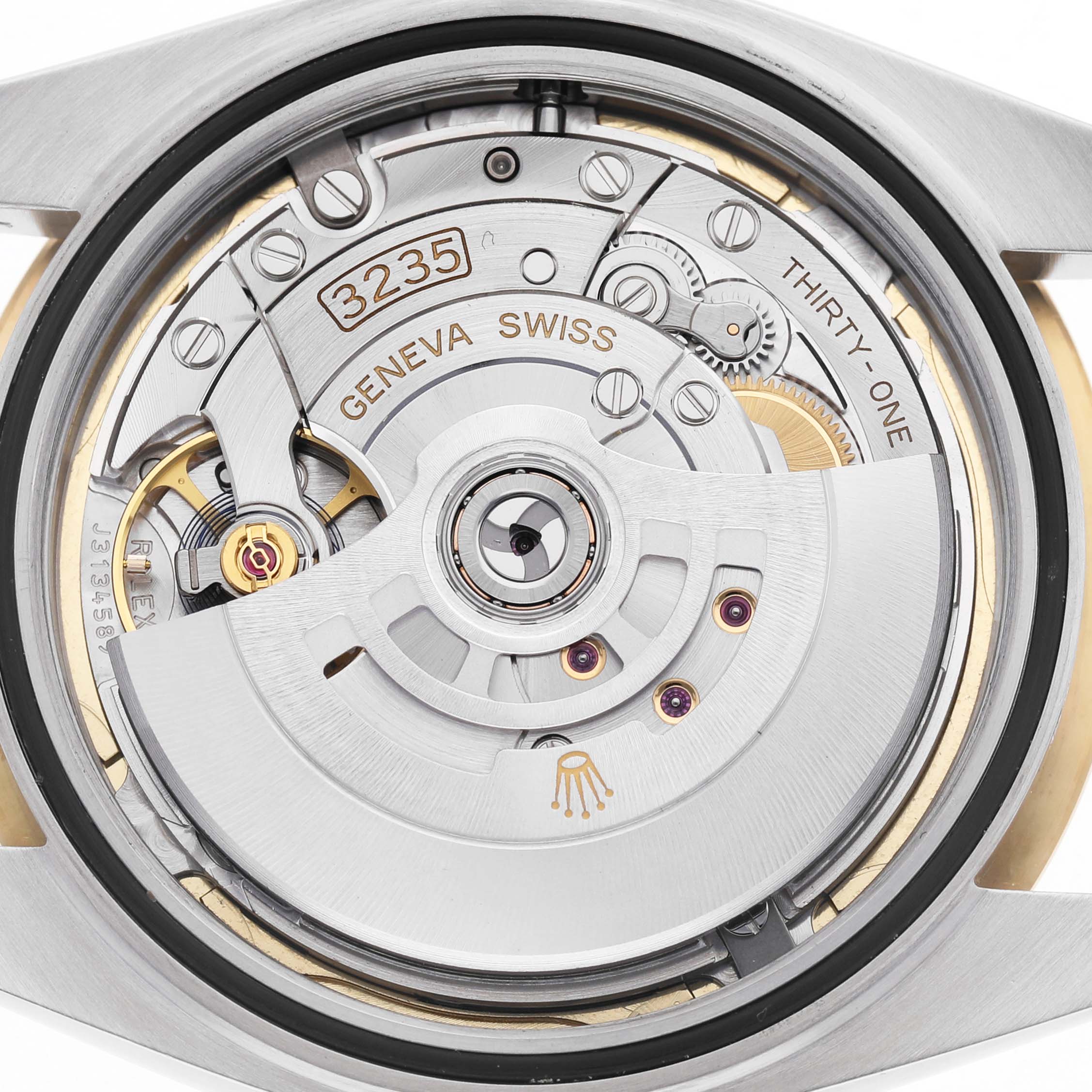 The image shows the case back of the Rolex Datejust 41 126333 Men's Steel and Gold (two tone) Champagne Dial, displaying the intricate movement and rotor.