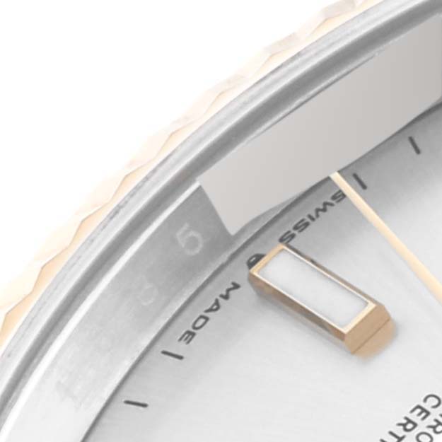The image shows a close-up of the dial's edge and hour marker of a Rolex Datejust 41 126333 Men's Steel and Gold (two tone) Silver Dial 126333 Men's Steel and Gold (two tone) Silver Dial watch.