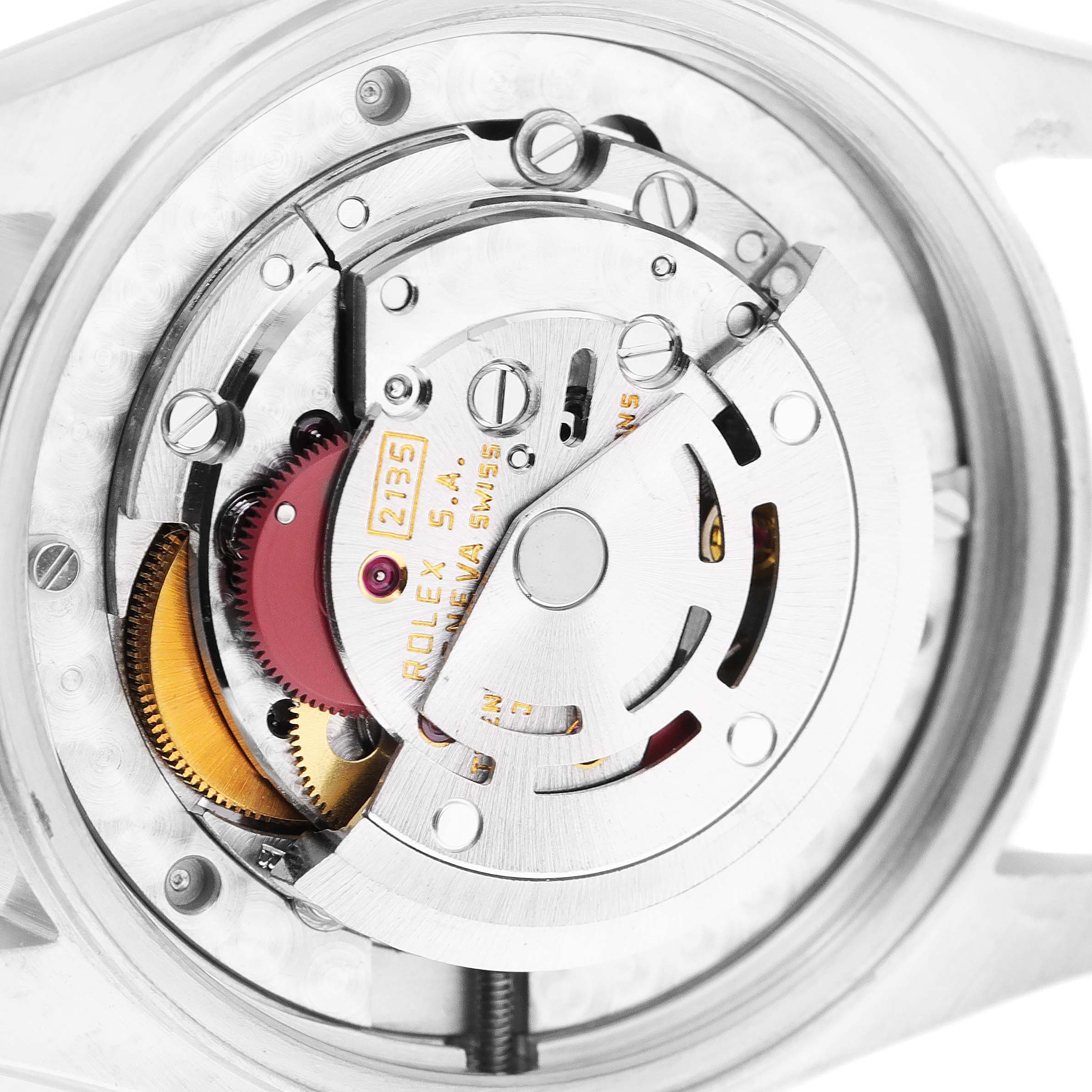 This image shows the movement with the rotor and gears of a Rolex Mid-Size 68273 Women's Steel and Gold (two tone) Champagne Dial 68273 Women's Steel and Gold (two tone) Champagne Dial watch viewed from the back.