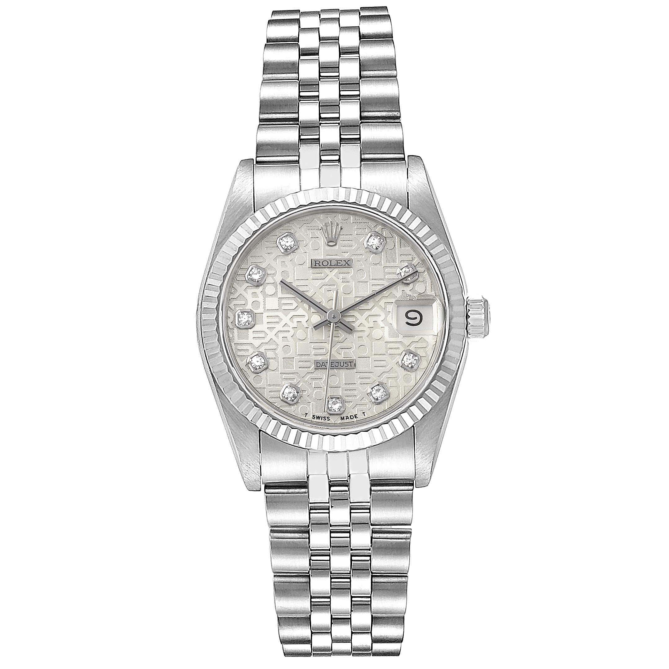 This image shows a front view of a Rolex Mid-Size 68274 Women's Stainless Steel Silver Dial 68274 Women's Stainless Steel Silver Dial watch, highlighting its silver dial, fluted bezel, bracelet, and date window.